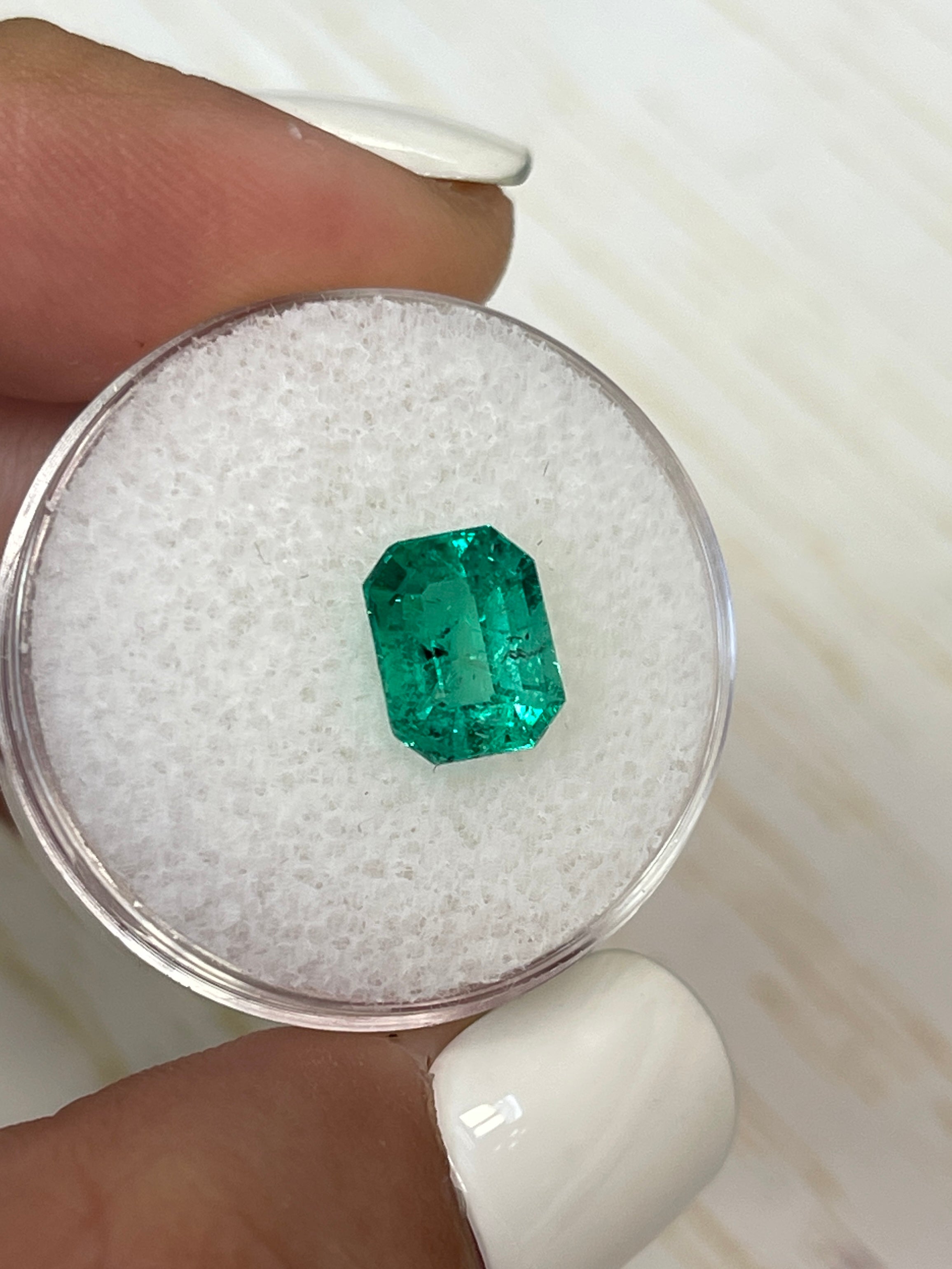 9x7mm freckled bluish-green Colombian emerald loose stone, 2.12 carats, emerald cut, natural gemstone from JR Colombian Emeralds
