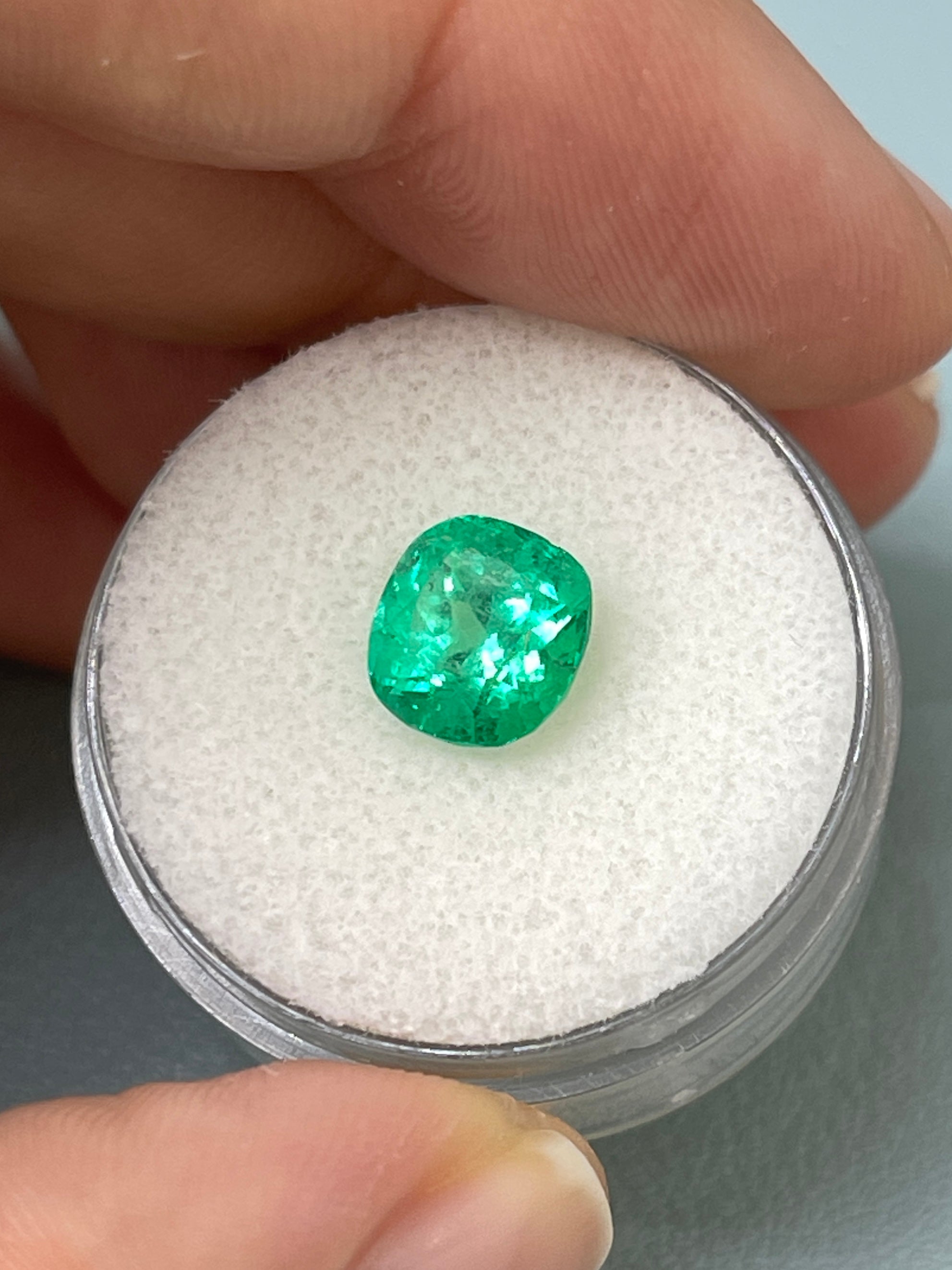 Natural loose 2.13 carat Colombian emerald, cushion cut, vibrant green, electric Muzo quality from JR Colombian Emeralds.