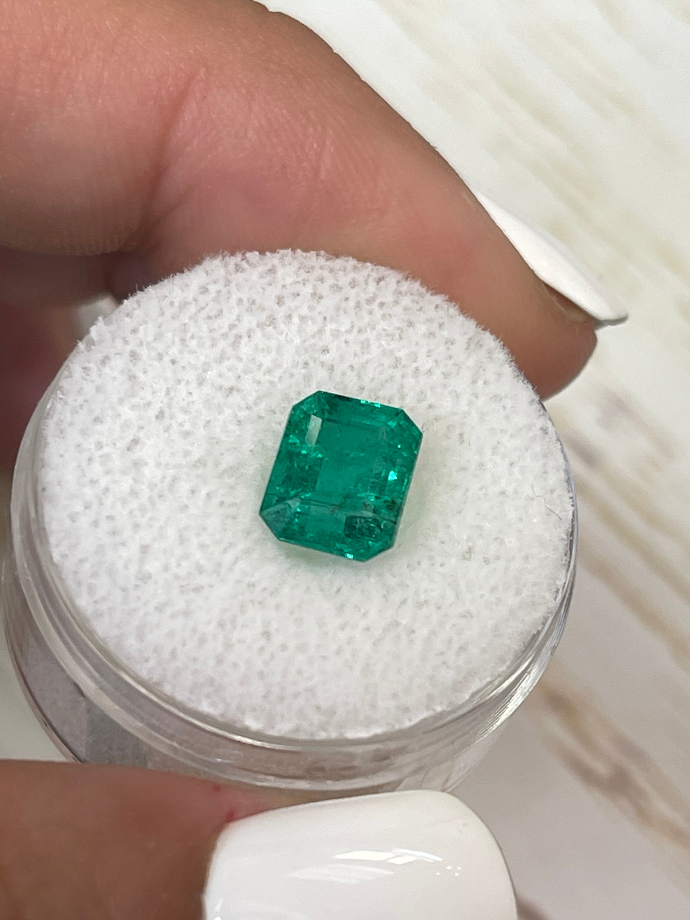 Medium green 2.26 carat Zambian emerald in emerald cut, natural loose gemstone from JR Colombian Emeralds.
