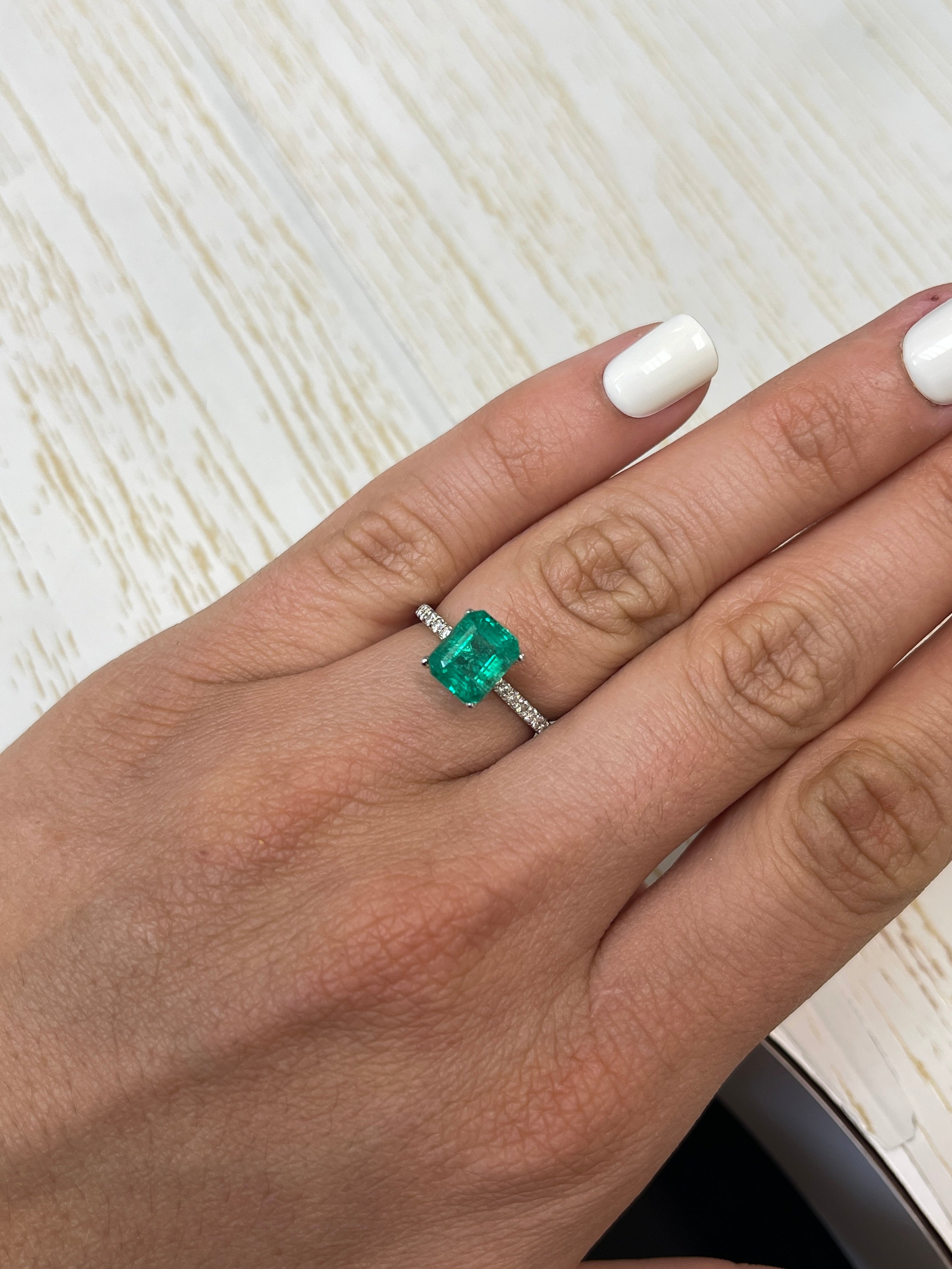 Medium green 2.26 carat natural Zambian emerald in emerald cut, loose gemstone from JR Colombian Emeralds.