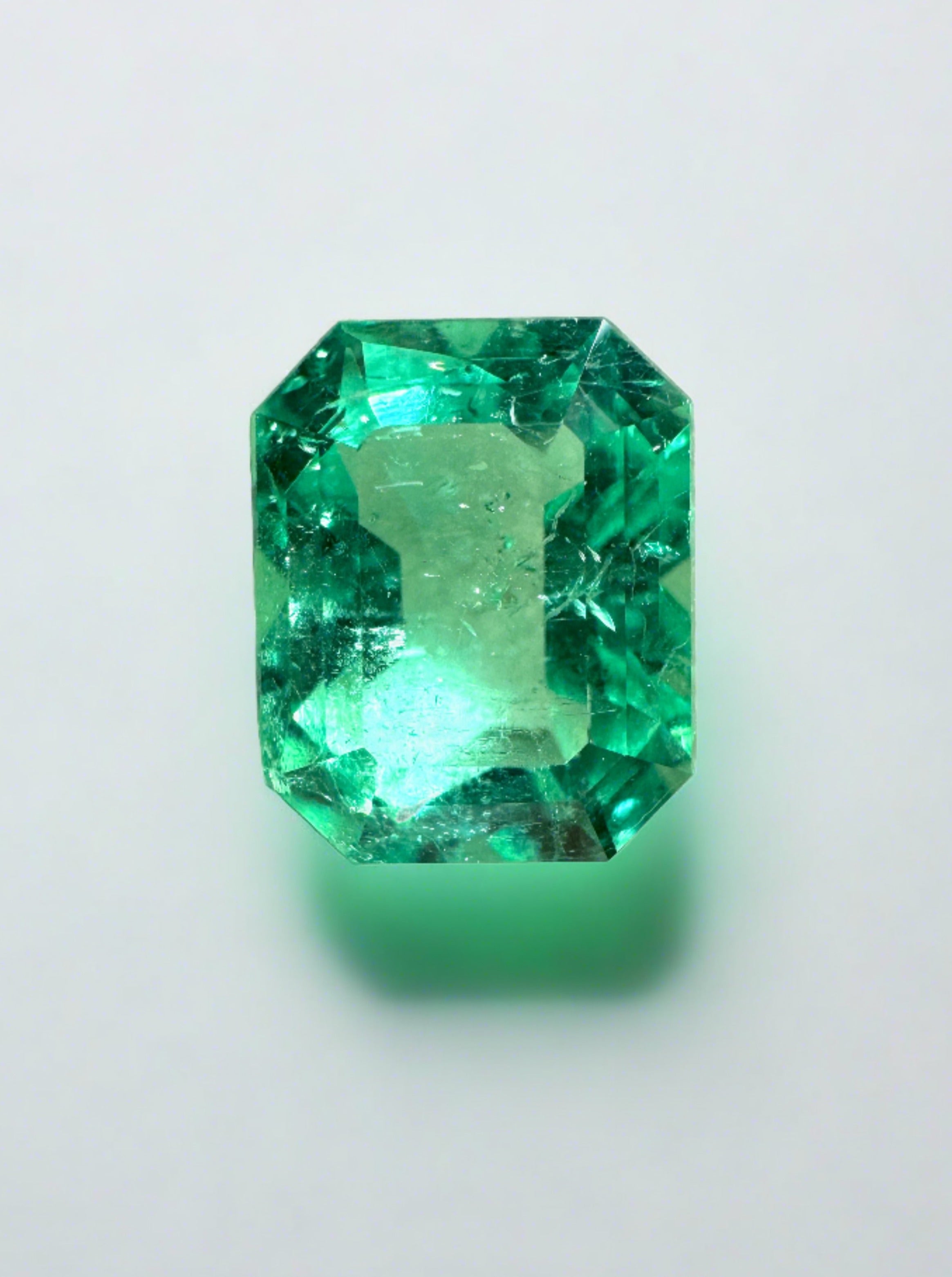 2.26 carat natural Colombian emerald, 9x7mm emerald cut, crystalline yellowish-green loose gemstone from JR Colombian Emeralds.