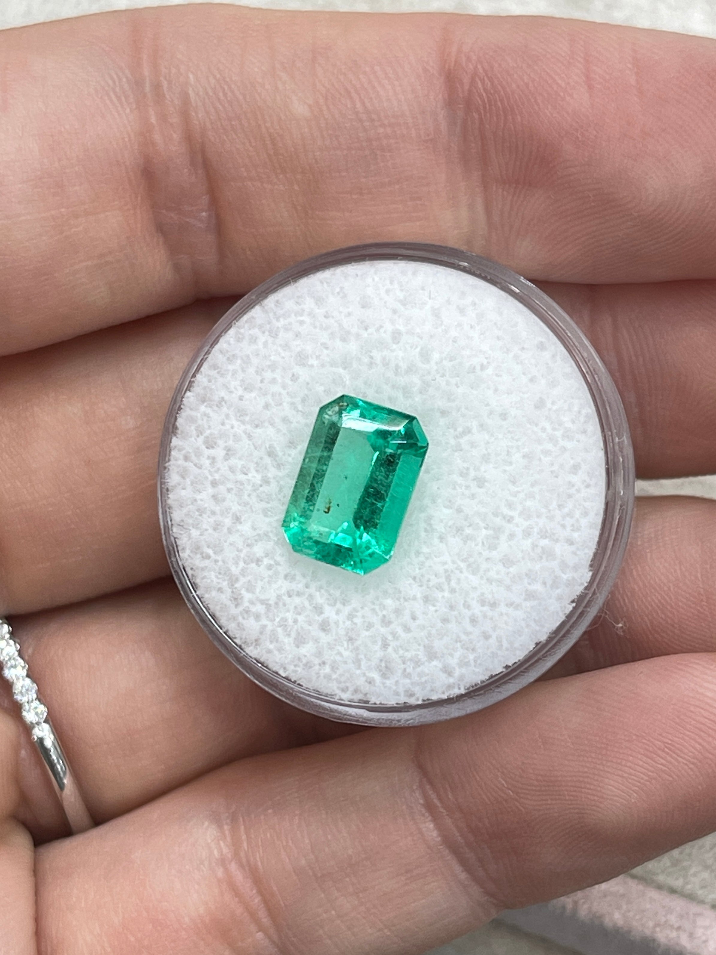 2.31 Carat 10x7 Freckled Medium Green Emerald Cut Colombian Emerald - JR Colombian Emeralds
