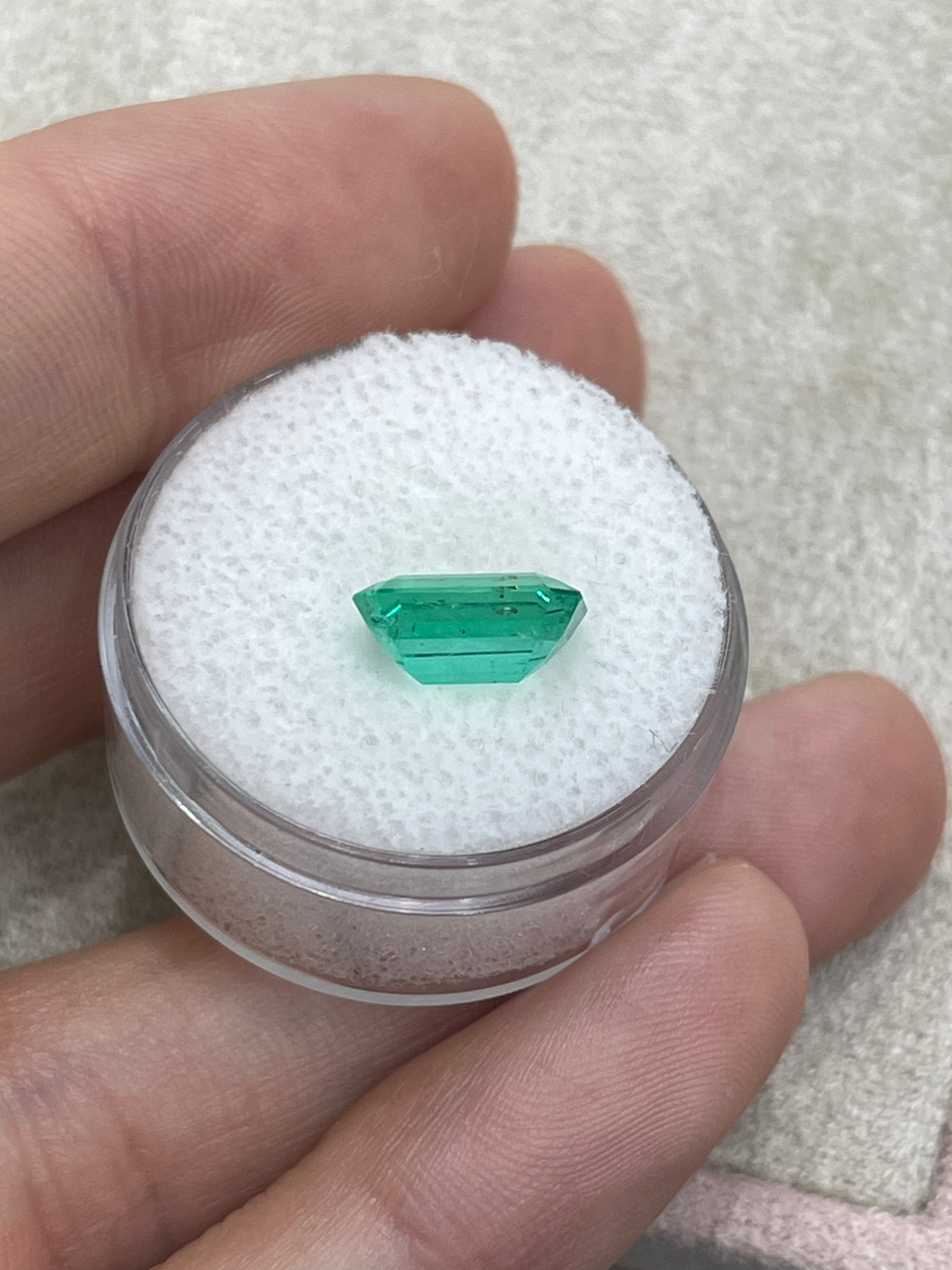 2.31 Carat 10x7 Freckled Medium Green Emerald Cut Colombian Emerald - JR Colombian Emeralds