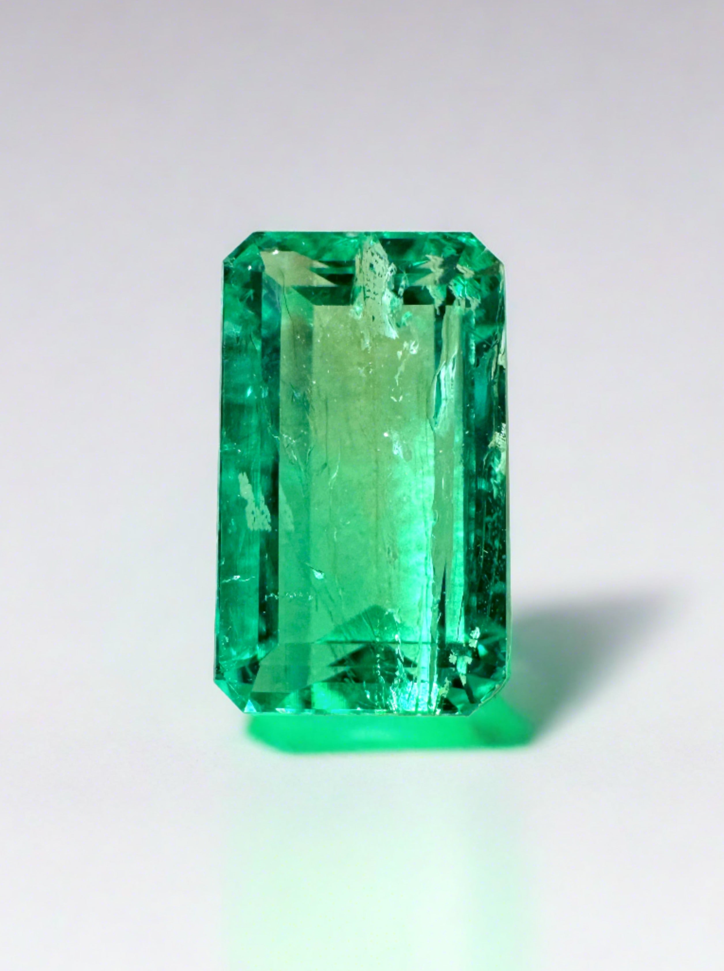 2.38 carat Muzo green Colombian emerald loose gemstone, emerald cut, slender 10x6 mm, from JR Colombian Emeralds.