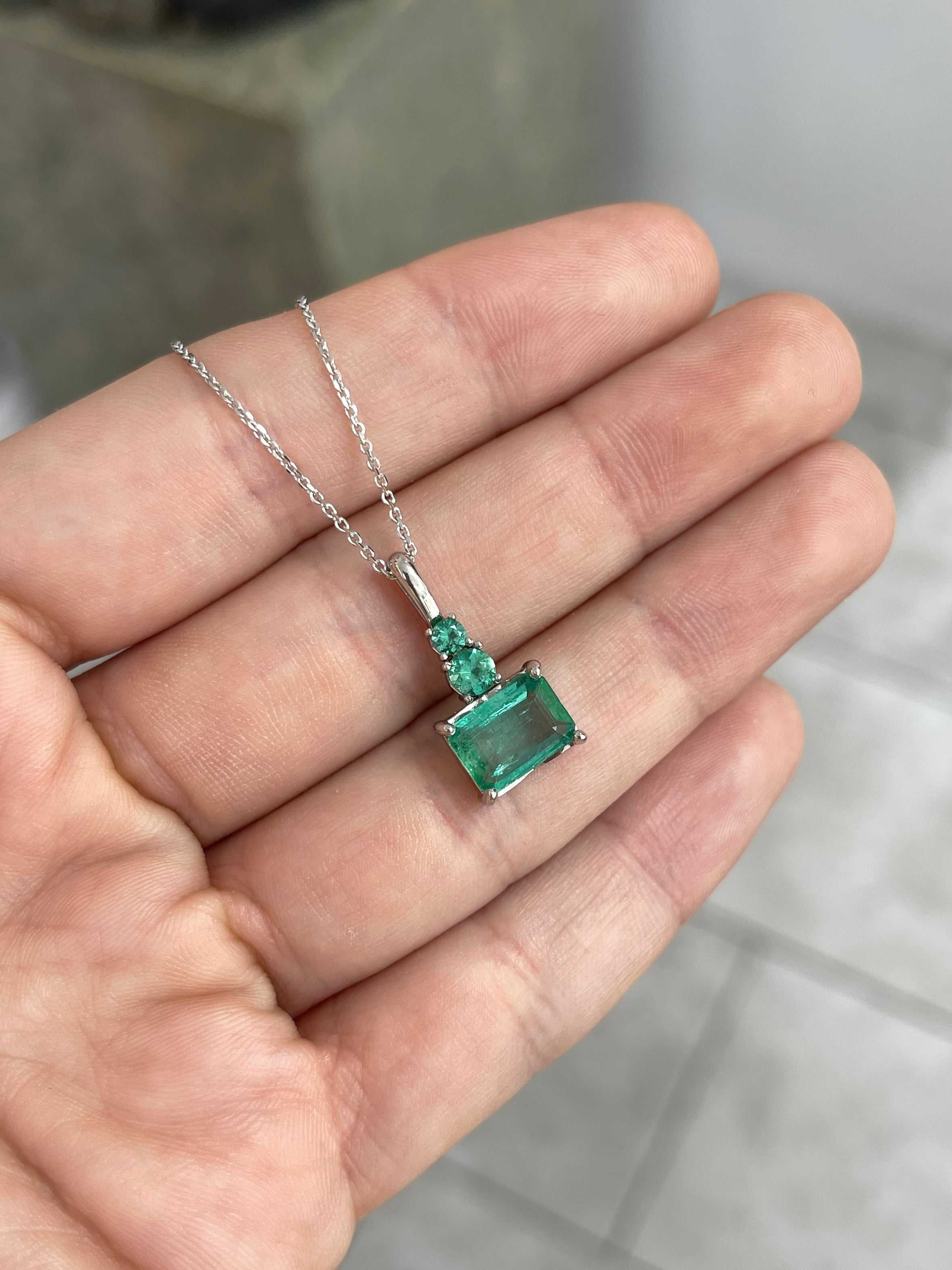 JR Colombian Emeralds 14K white gold necklace featuring 2.43tcw crystal clear East to West emerald and round emerald accents.