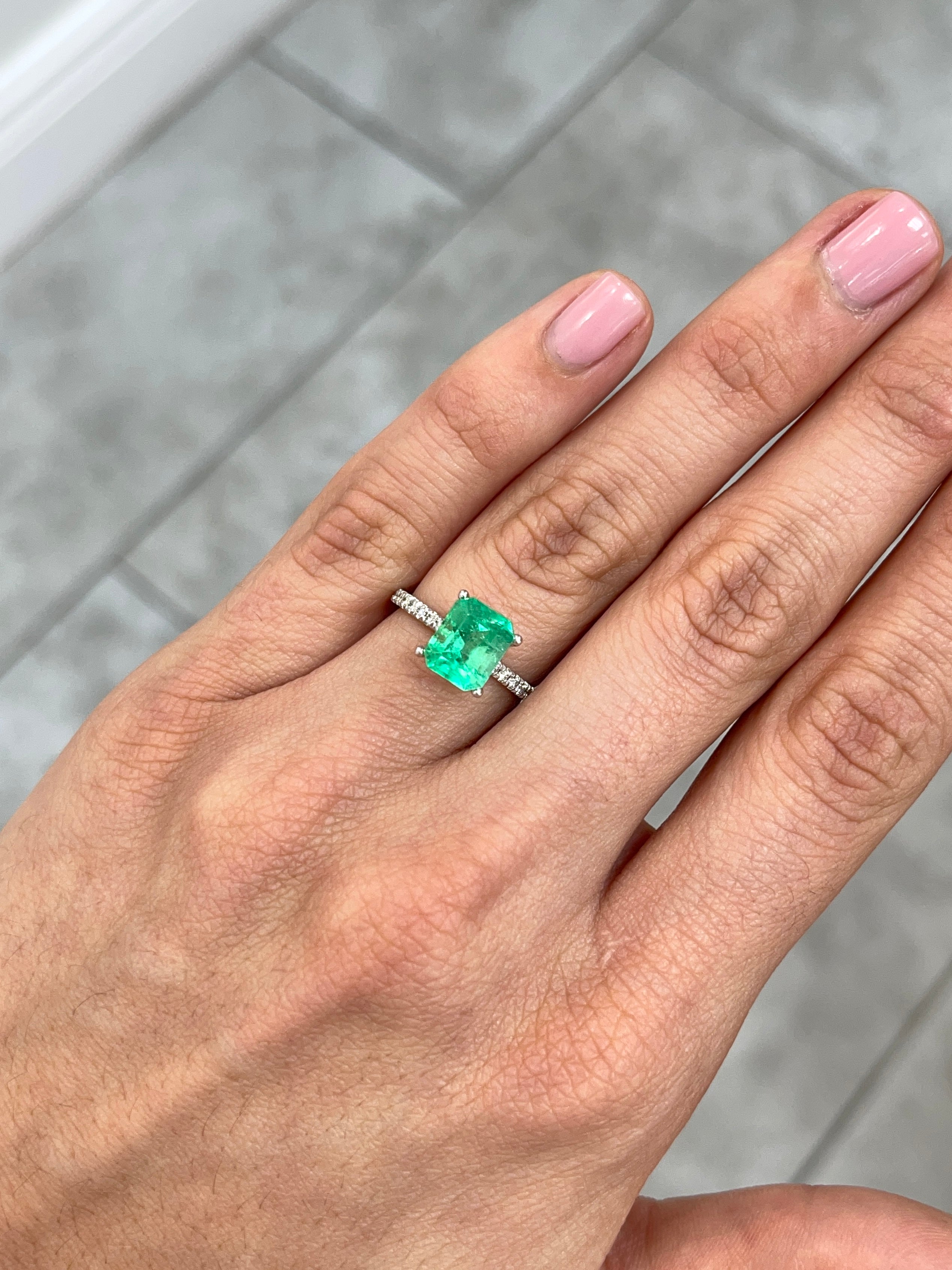 2.47 carat yellowish green Colombian emerald loose gemstone in an emerald cut, natural and from JR Colombian Emeralds.