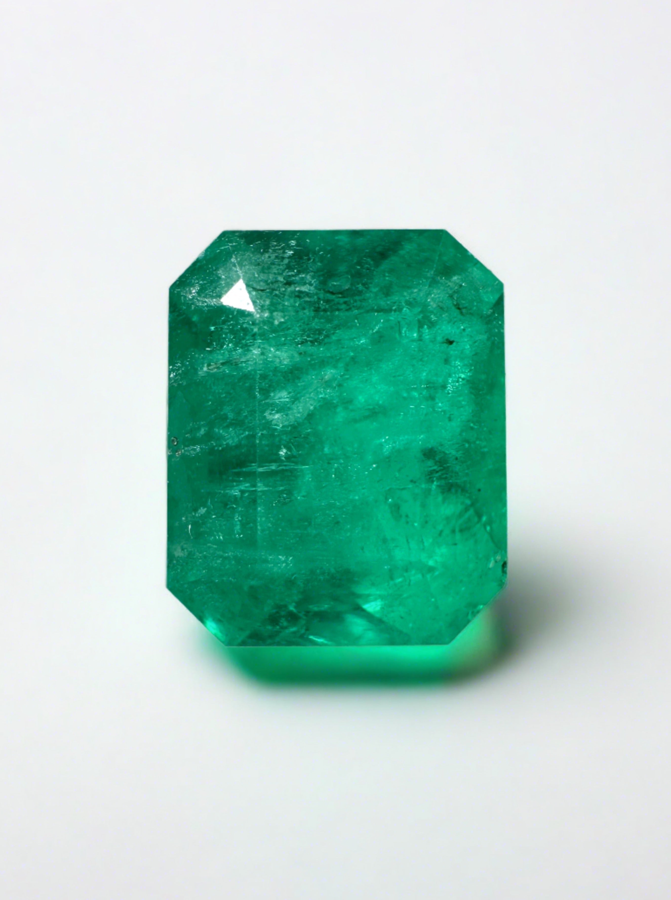 2.52 Carat intense green natural Colombian emerald in an emerald cut, showcasing vibrant color and clarity, by JR Colombian Emeralds.