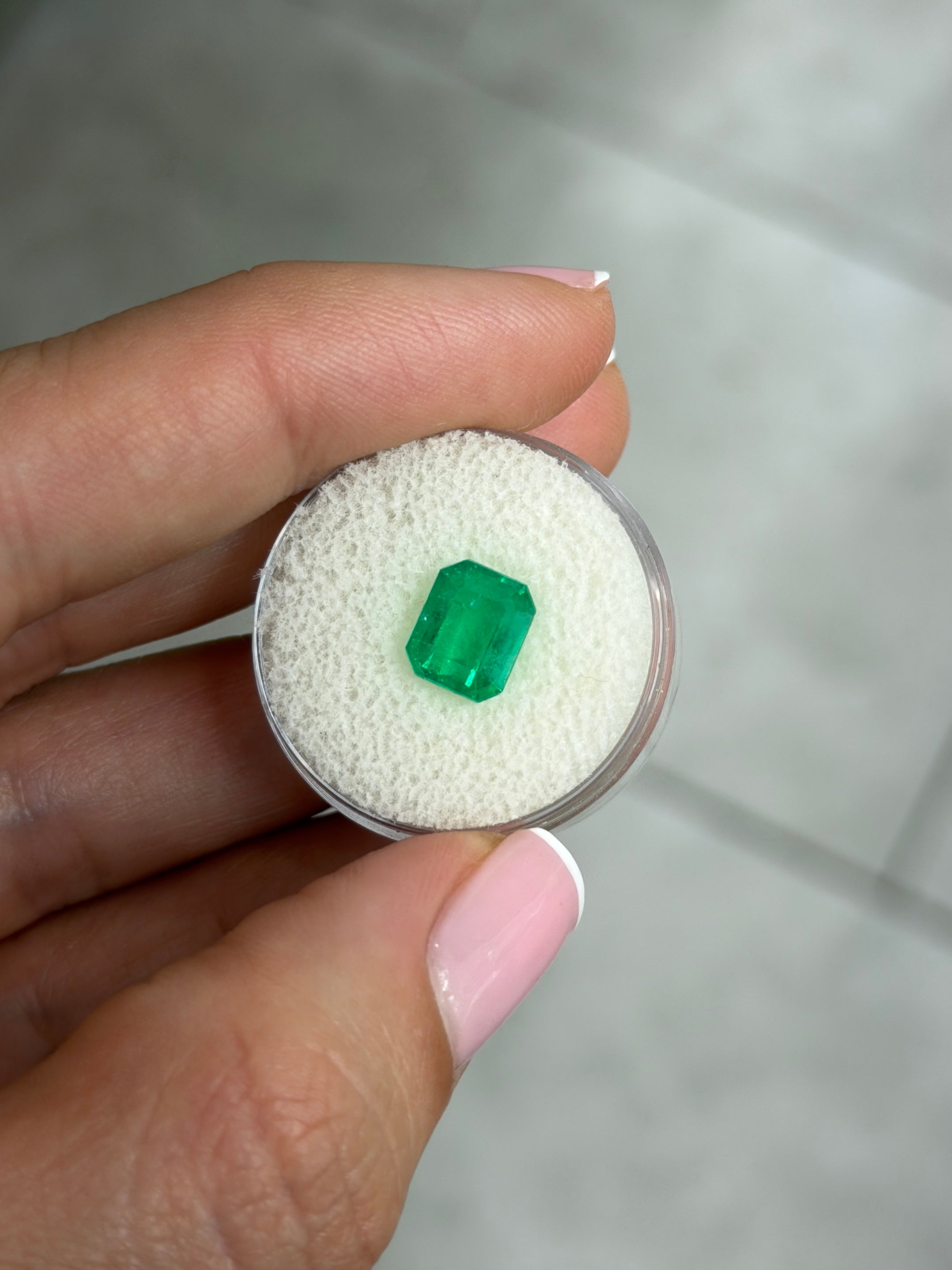 2.57 carat natural vivid Colombian emerald loose gemstone 9x7mm emerald cut yellowish green from JR Colombian Emeralds