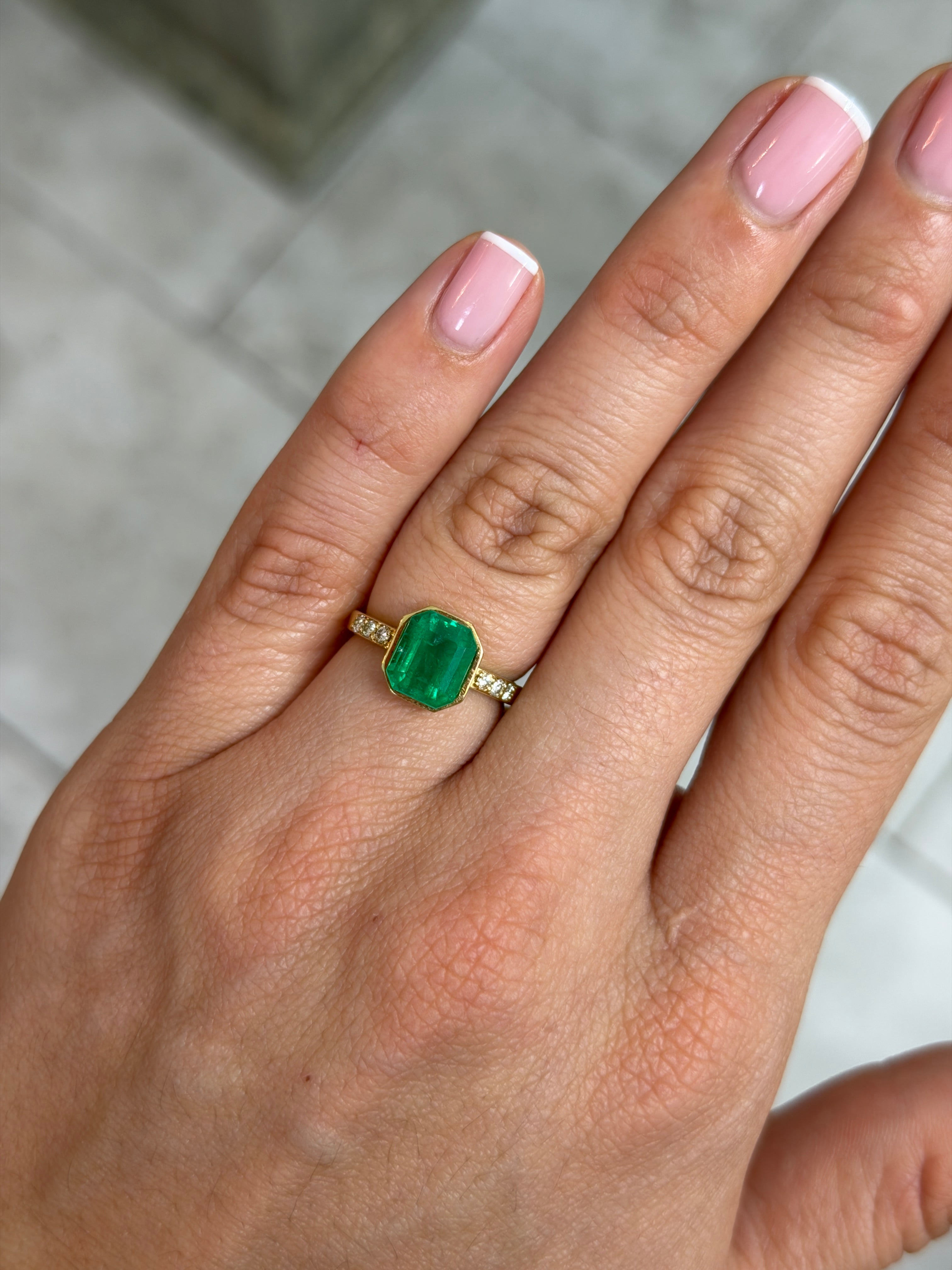 Natural 2.57 carat vivid Colombian emerald loose gemstone, 9x7 emerald cut, yellowish green from JR Colombian Emeralds