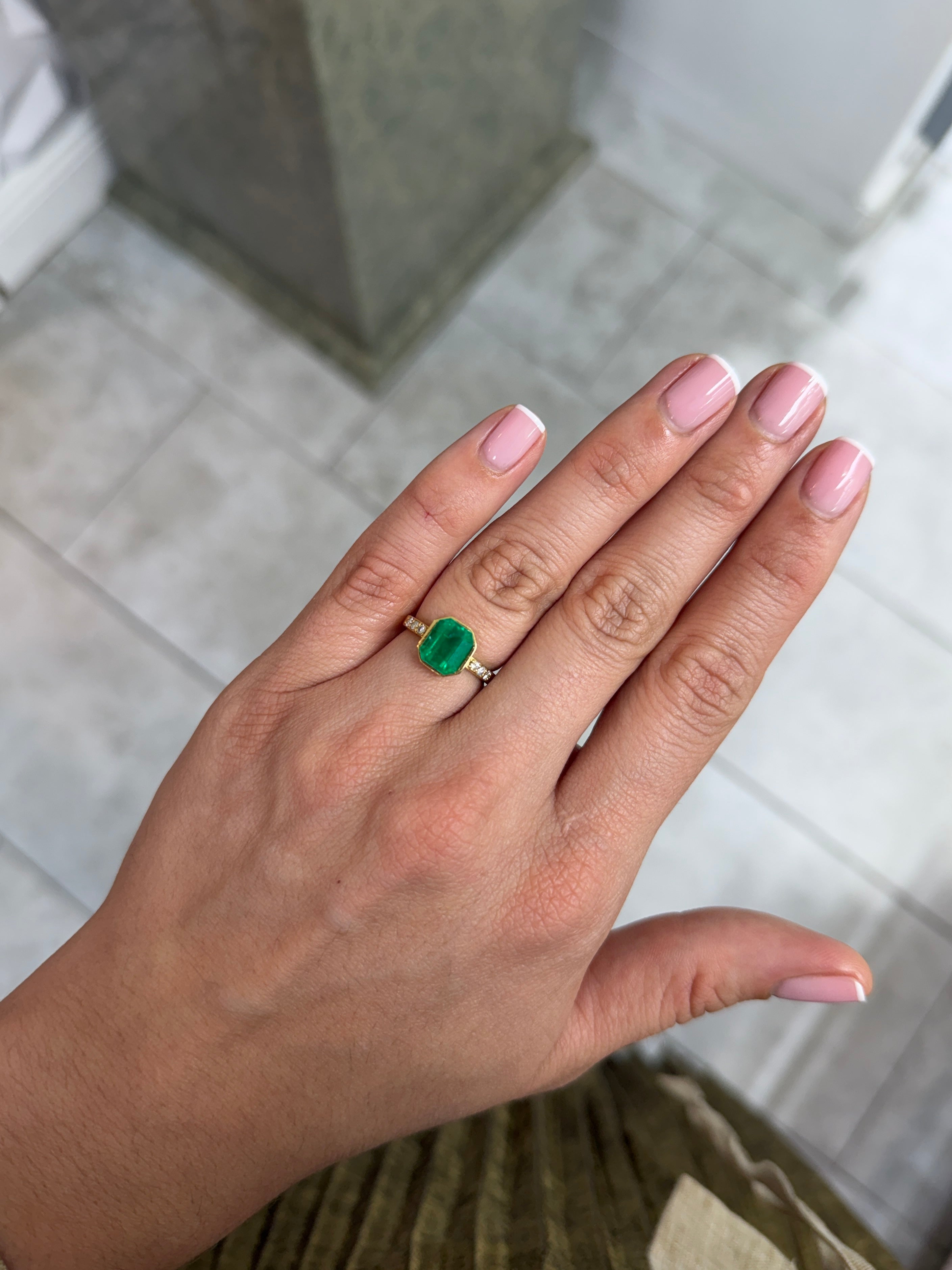 2.57 carat natural vivid Colombian emerald loose gemstone, 9x7 emerald cut, yellowish green color, from JR Colombian Emeralds