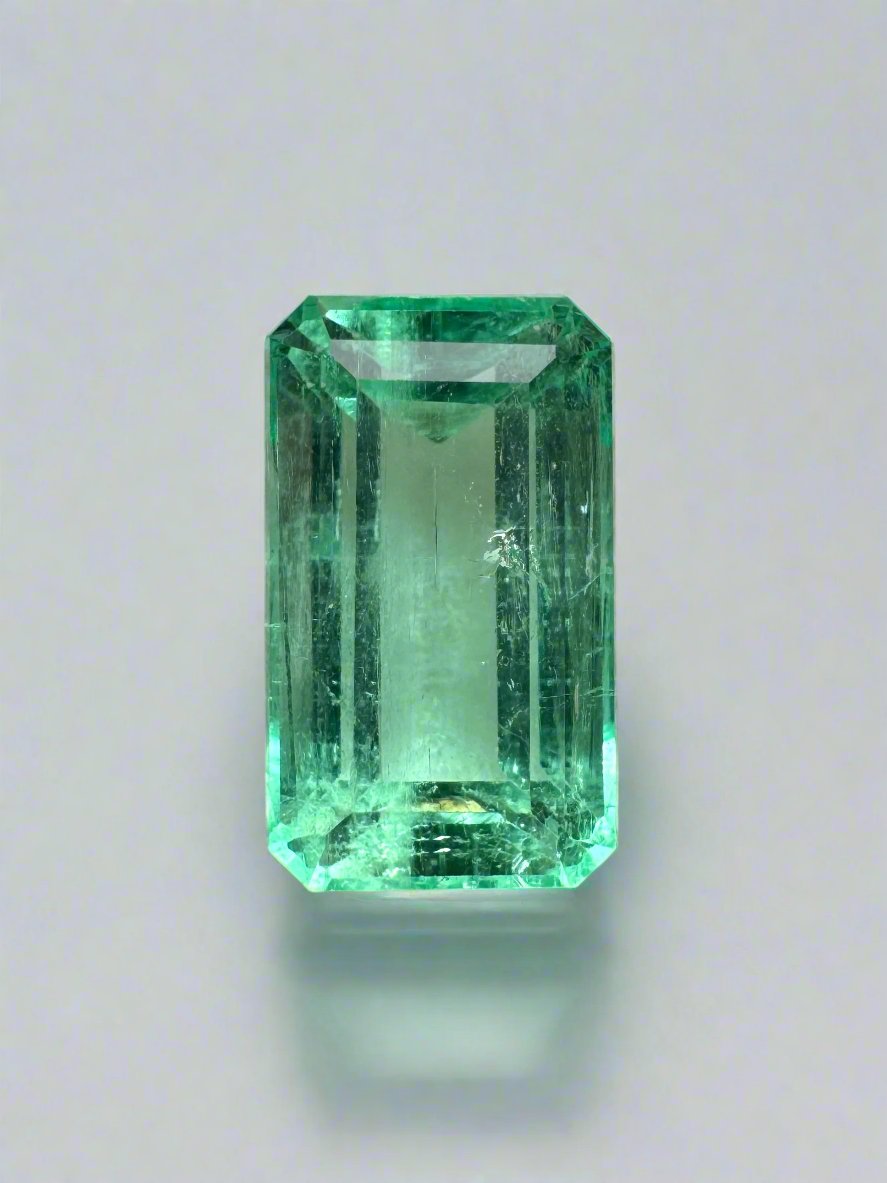 2.64 carat emerald cut Colombian emerald with pastel yellow-green color, loose gemstone from JR Colombian Emeralds.