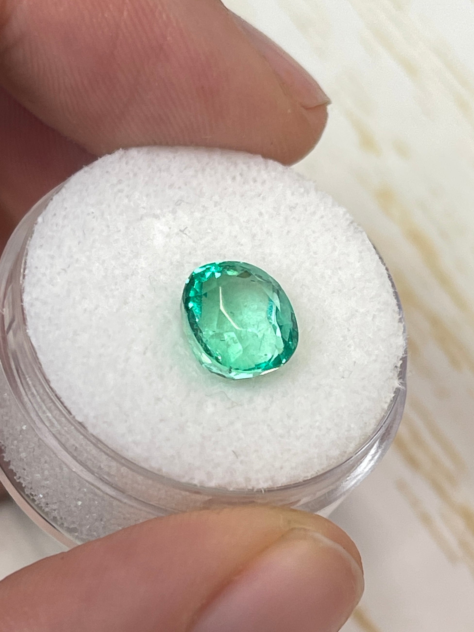 2.67 carat GLOWING Muzo green Colombian emerald loose cushion cut gemstone from JR Colombian Emeralds.