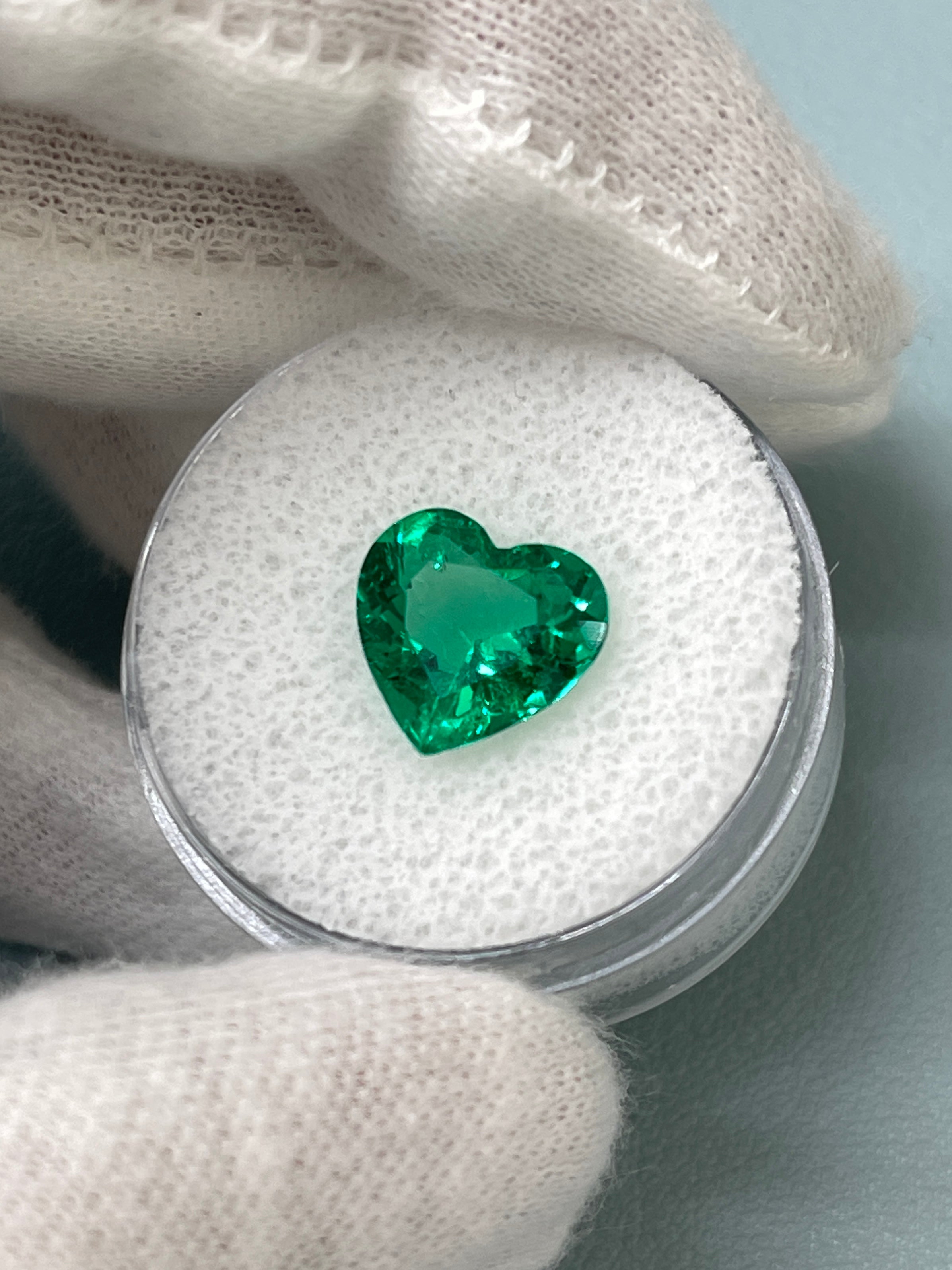 Vivid green 2.68 Carat AAA+ Colombian Emerald in heart cut, natural loose gemstone from JR Colombian Emeralds.