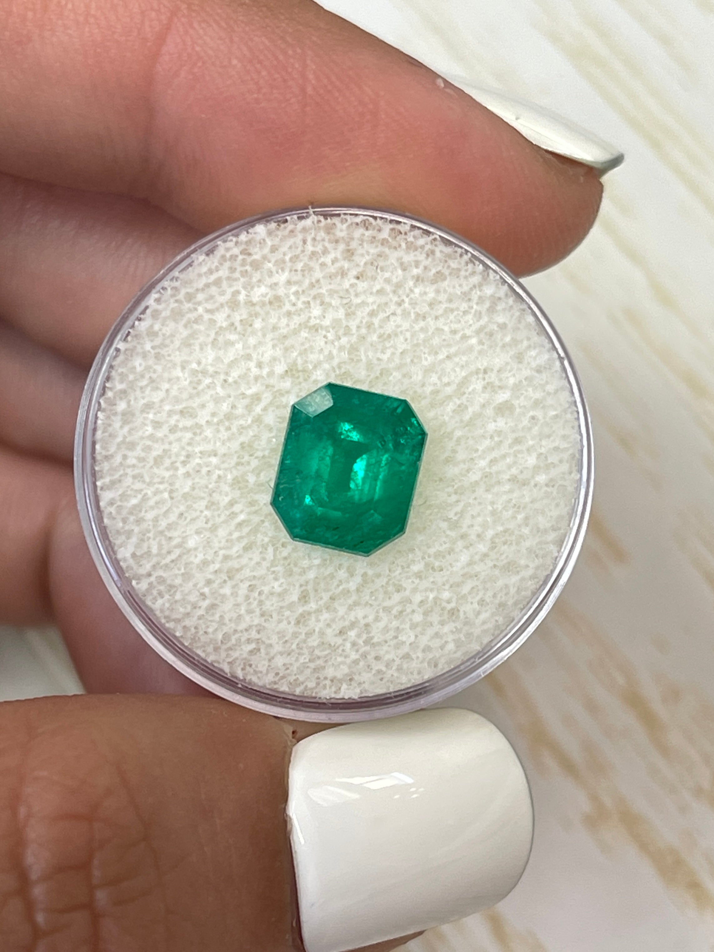 2.74 Carat deep bluish-green Colombian emerald loose gemstone in an emerald cut, from JR Colombian Emeralds.