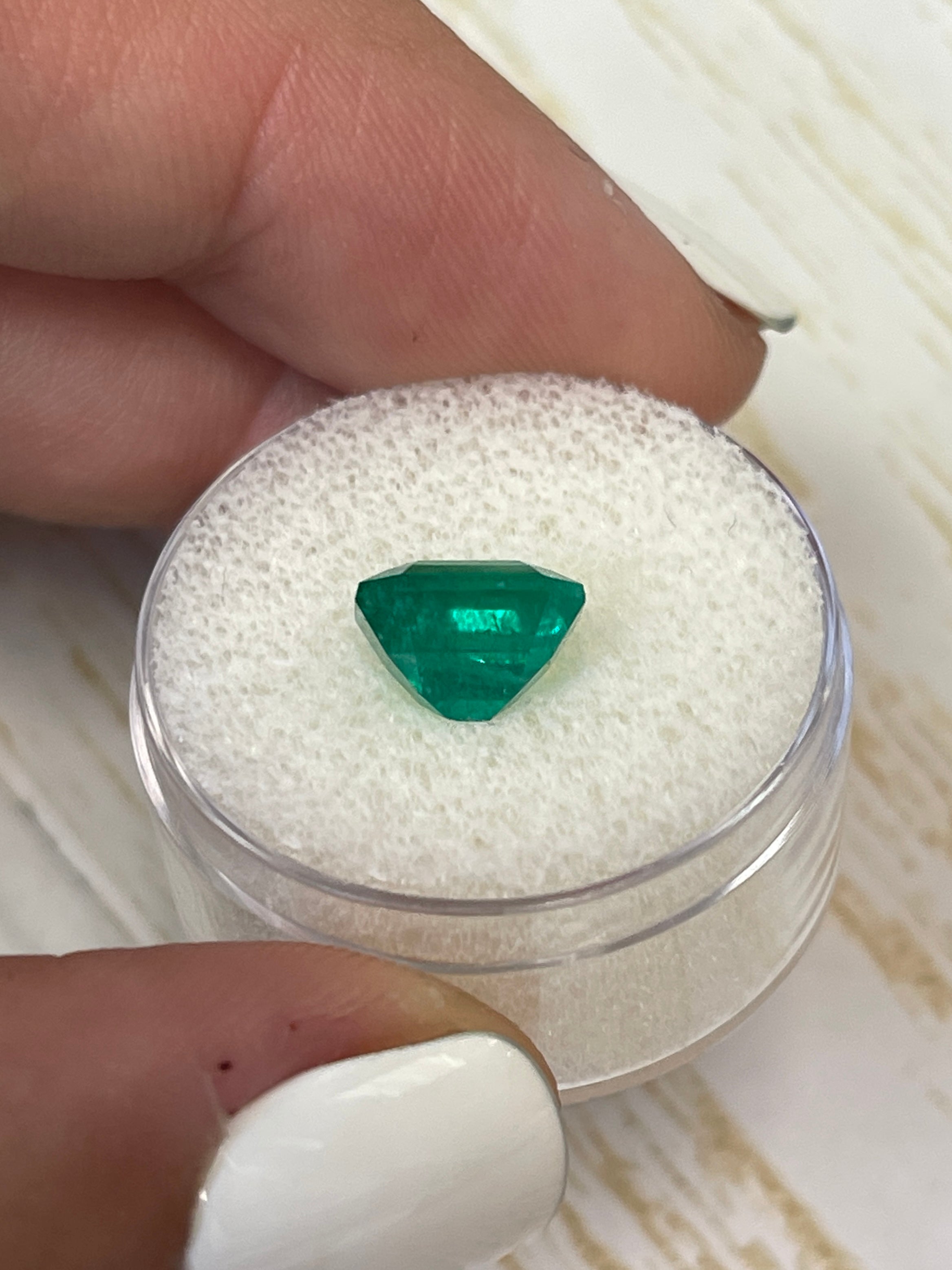 Deep bluish-green 2.74 carat Colombian emerald in an emerald cut, natural loose gemstone from JR Colombian Emeralds.