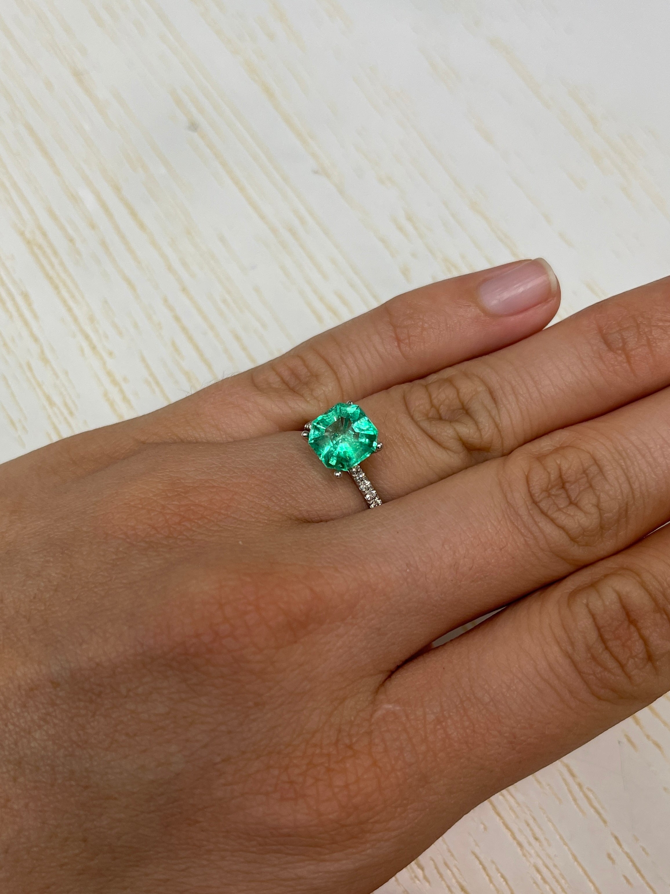 2.76 Carat natural Colombian emerald loose gemstone with Asscher cut and clipped corners, vibrant and vivid green from JR Colombian Emeralds.