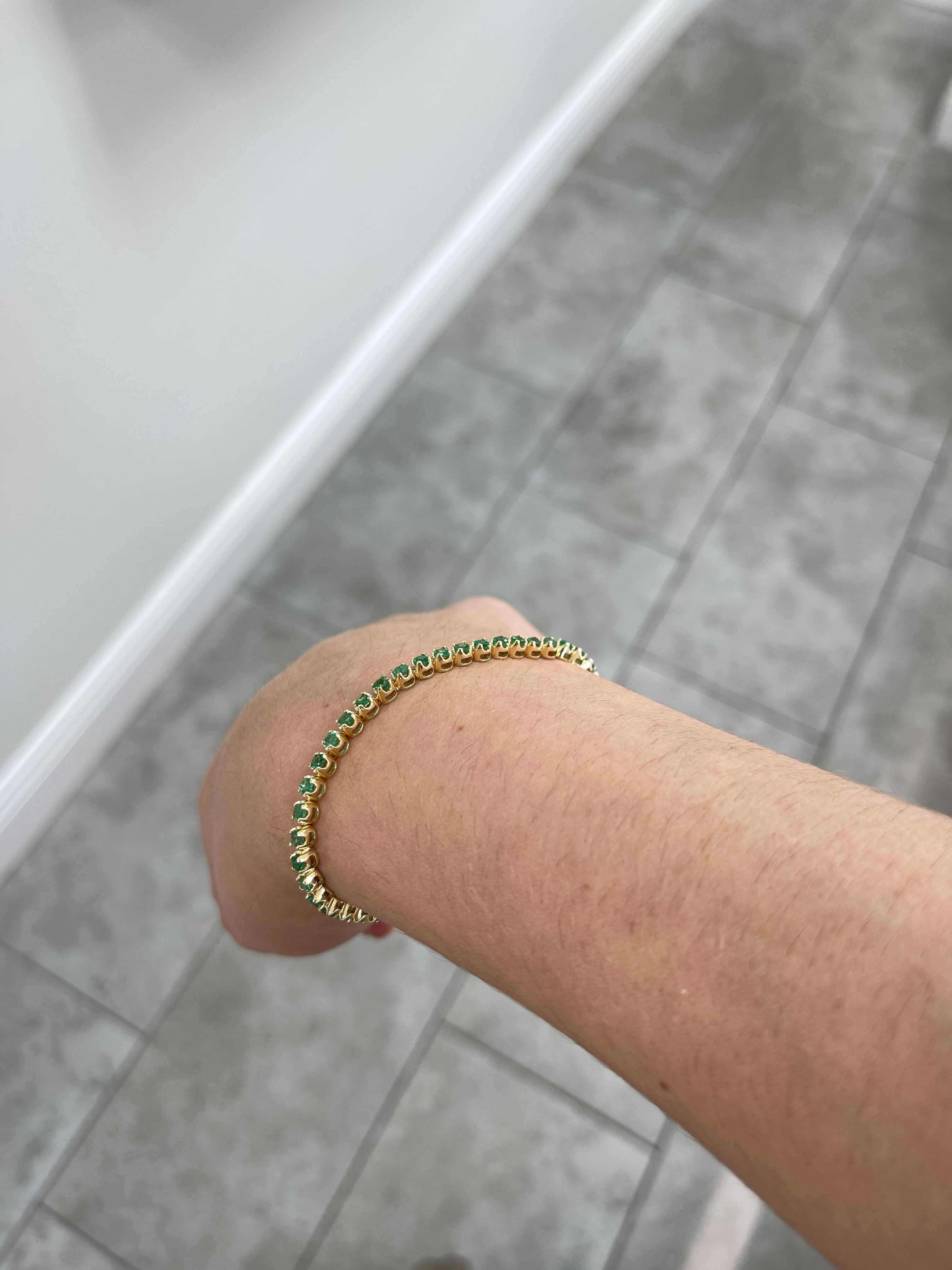 Medium green natural round emerald tennis bracelet by JR Colombian Emeralds, 14K gold, 7-inch length, 2.76 carats total weight.