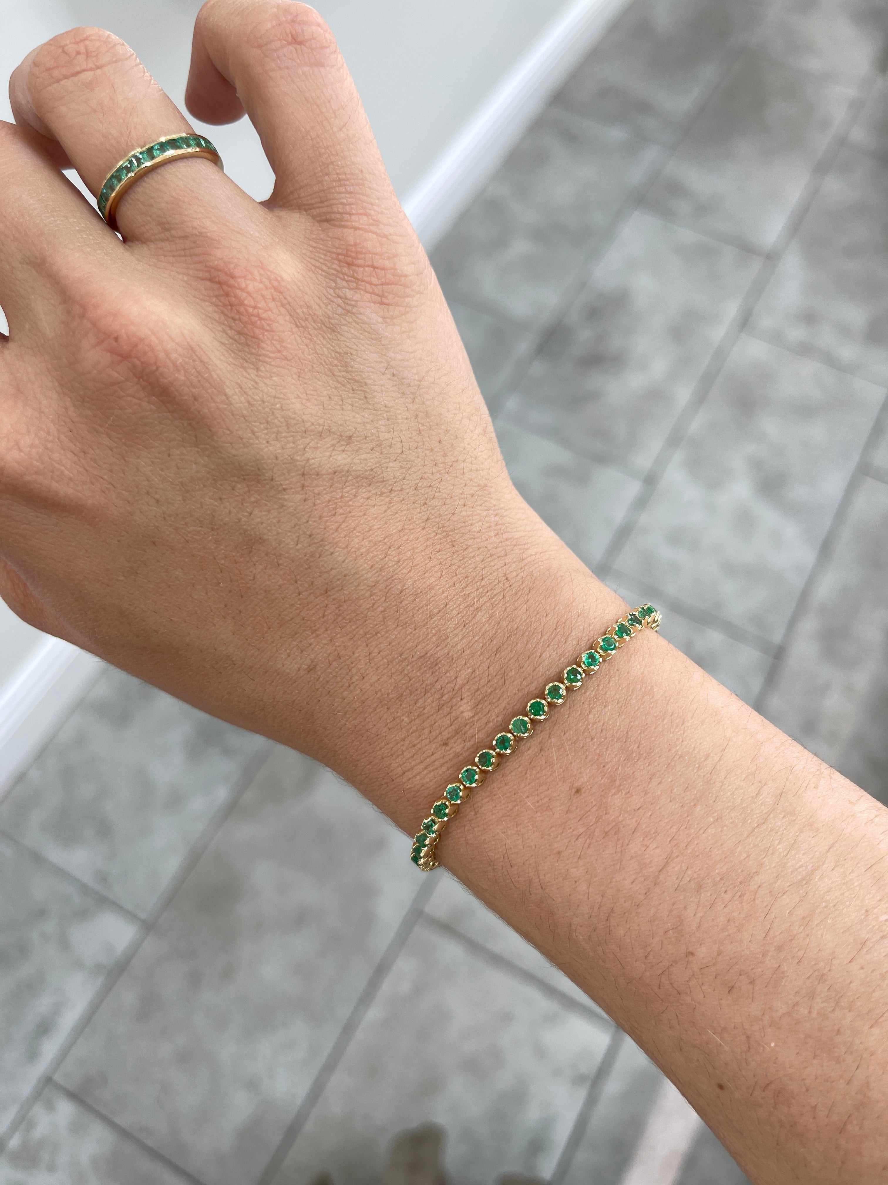 Medium green natural round emerald tennis bracelet by JR Colombian Emeralds, 14K gold, 7-inch length, 2.76 carats total weight.