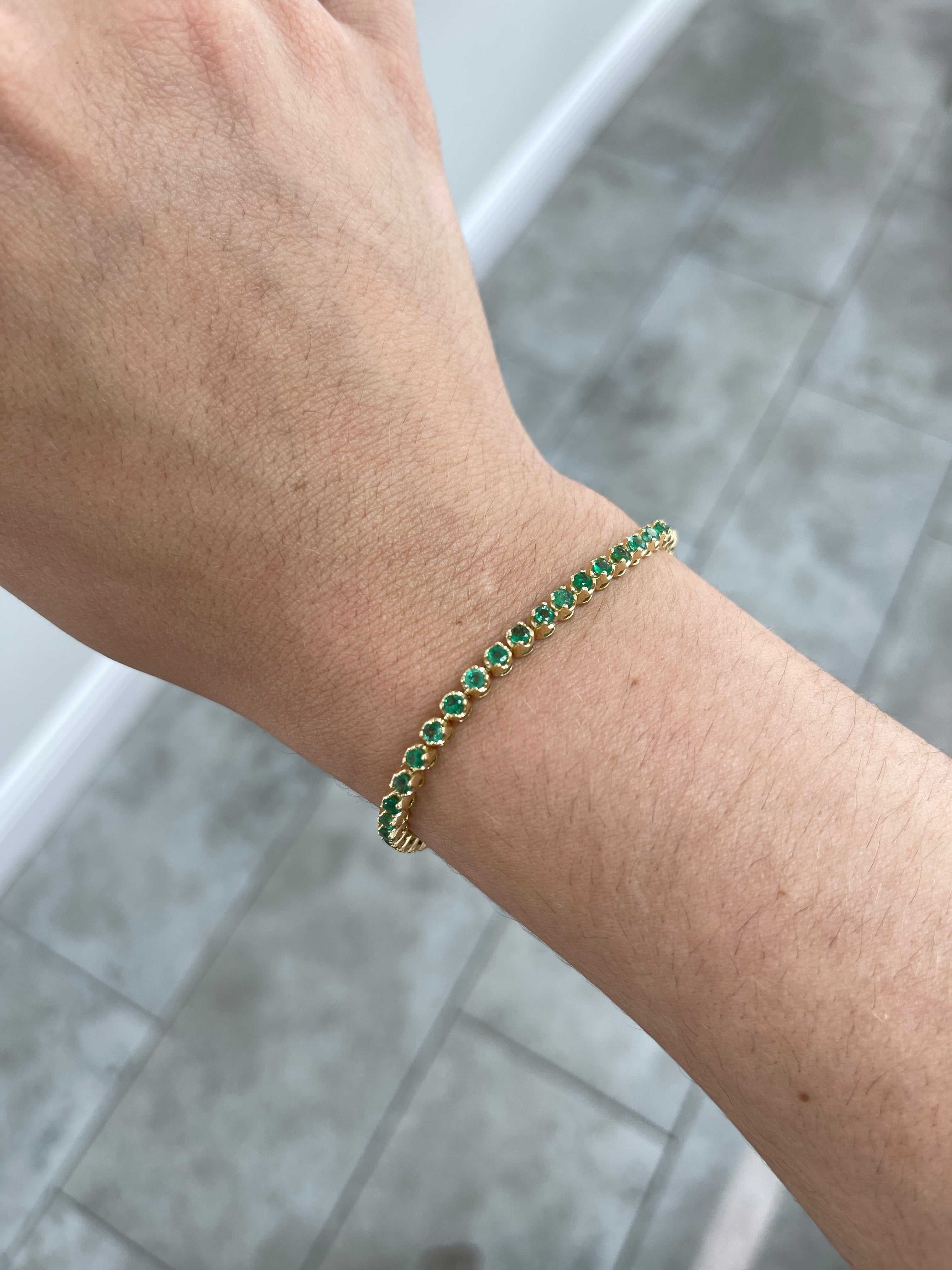 Medium green natural round emerald tennis bracelet by JR Colombian Emeralds, 14K gold, 7-inch length, 2.76 carats total weight