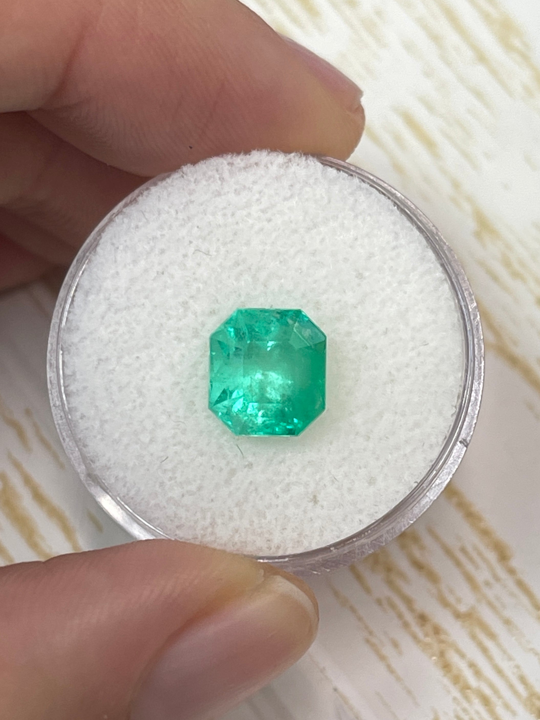 2.78 carat yellowish green natural Colombian emerald loose Asscher cut gemstone from JR Colombian Emeralds.
