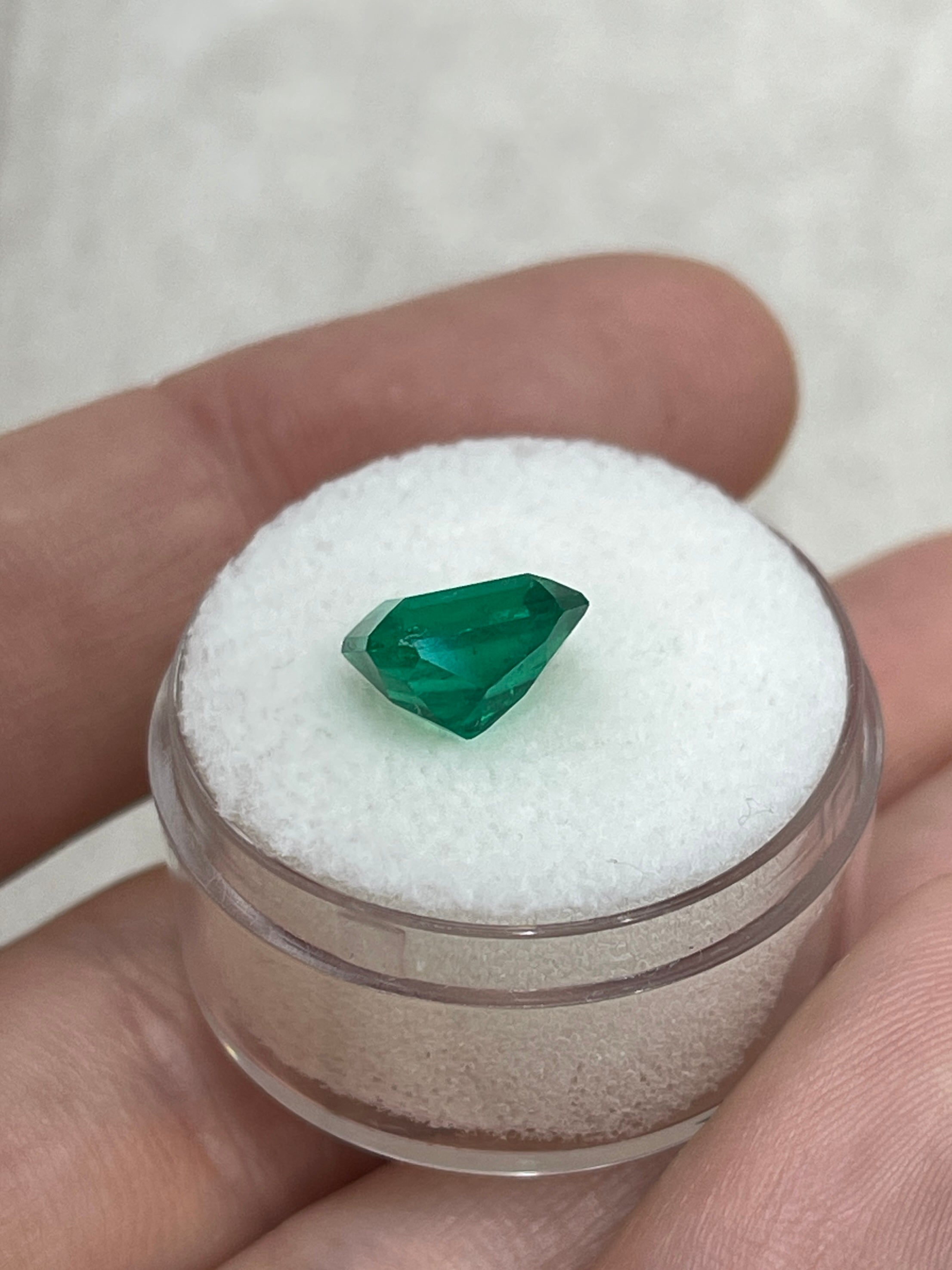 Vivid green 2.78 carat Colombian emerald cut loose gemstone displaying chunky shape and rich color, from JR Colombian Emeralds.
