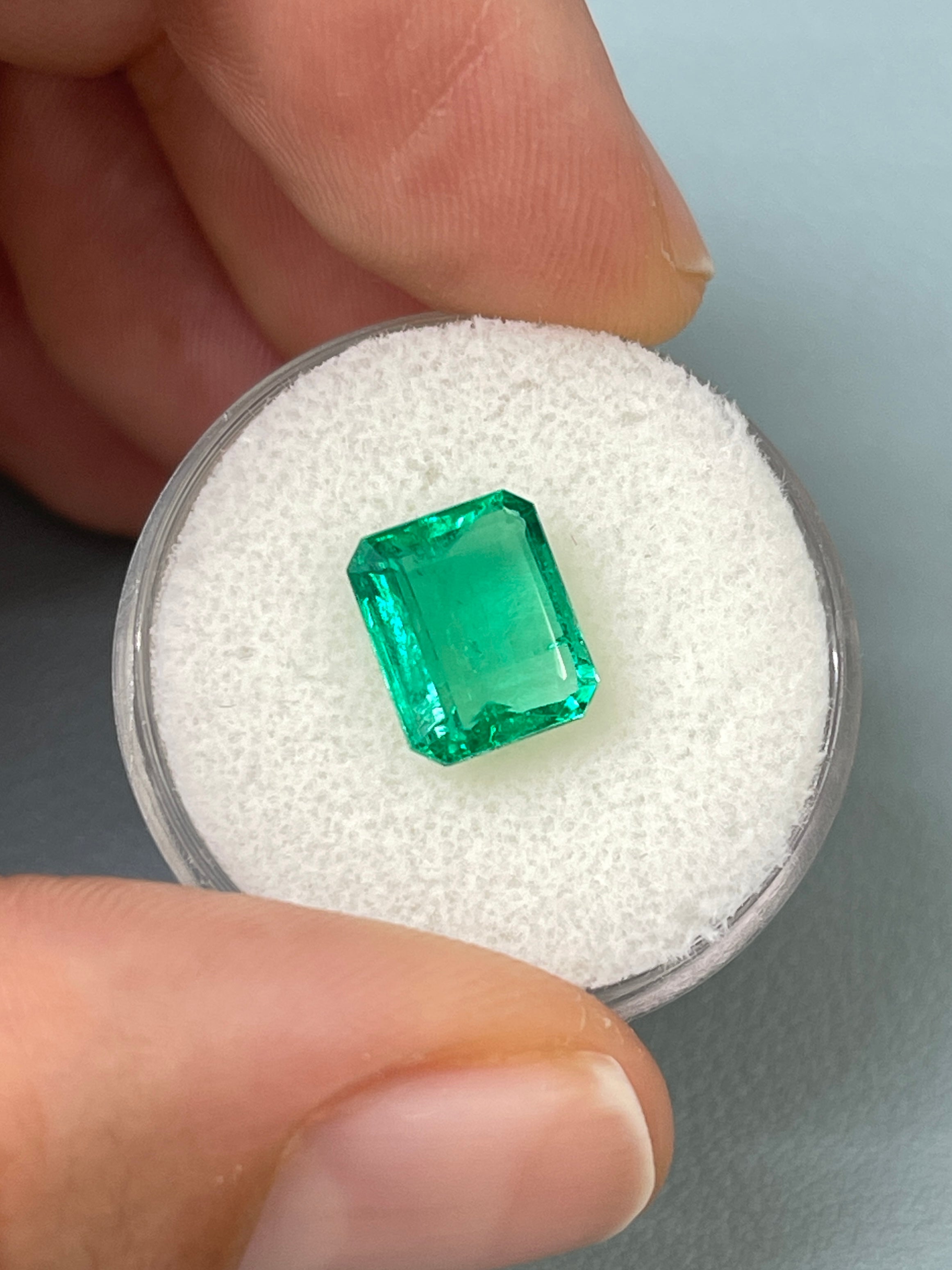 2.85 carat emerald cut Colombian emerald with crystalline green color, natural loose gemstone from JR Colombian Emeralds.