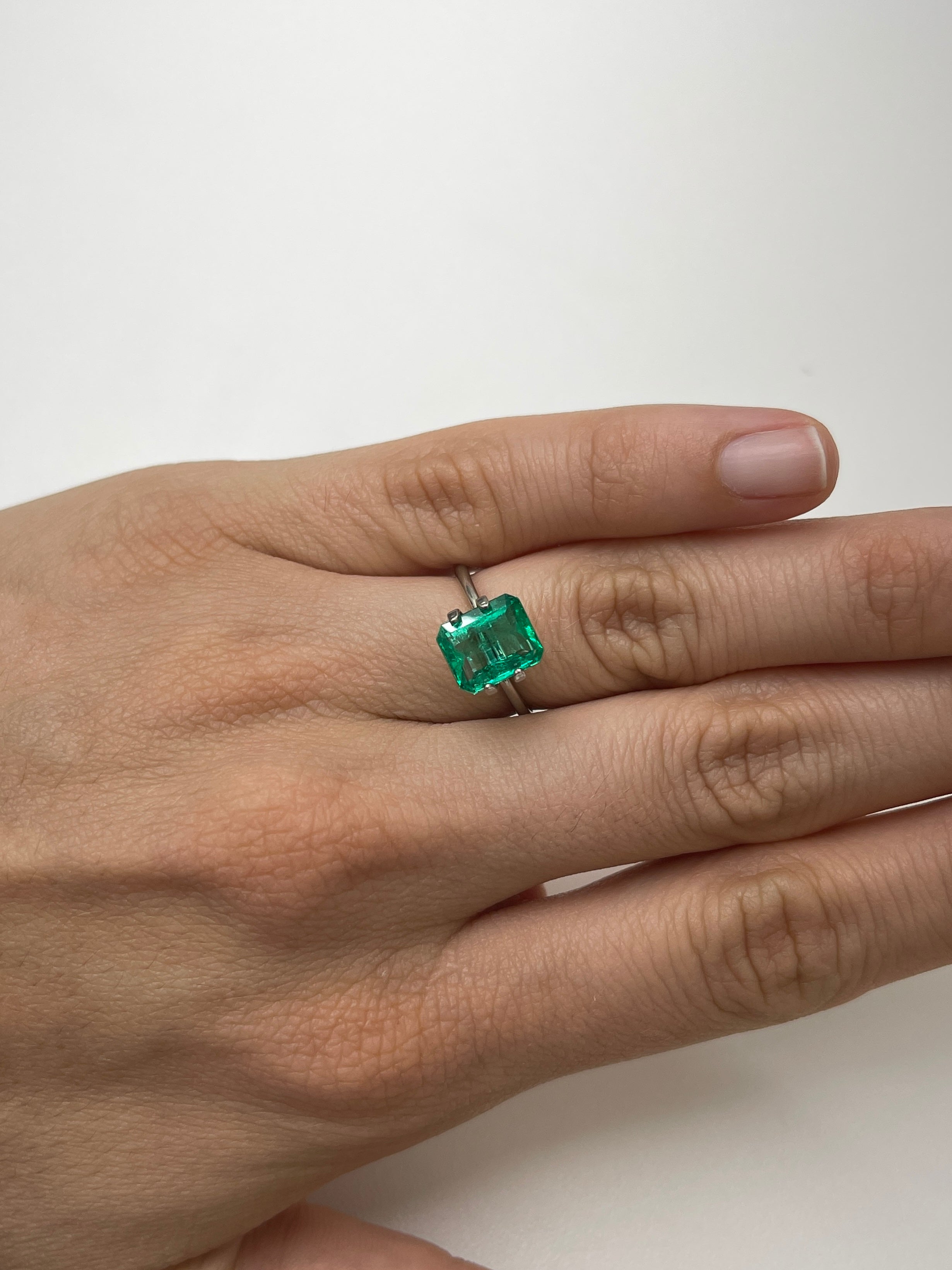 2.85 carat natural Colombian emerald loose gemstone with emerald cut, vibrant crystalline green color, from JR Colombian Emeralds.