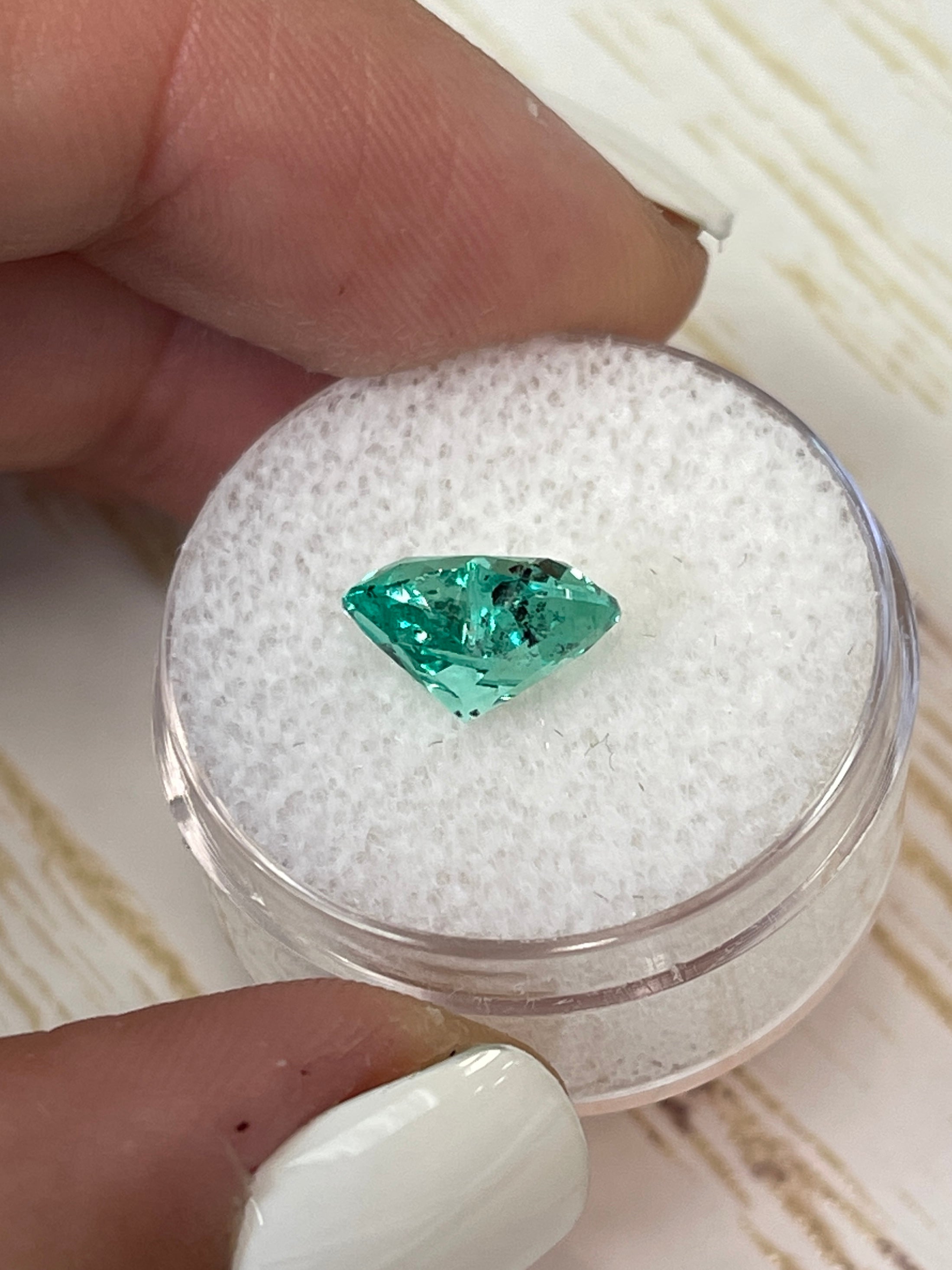 Lustrous 2.87 carat natural Colombian emerald heart cut loose gemstone from JR Colombian Emeralds, vivid green color.