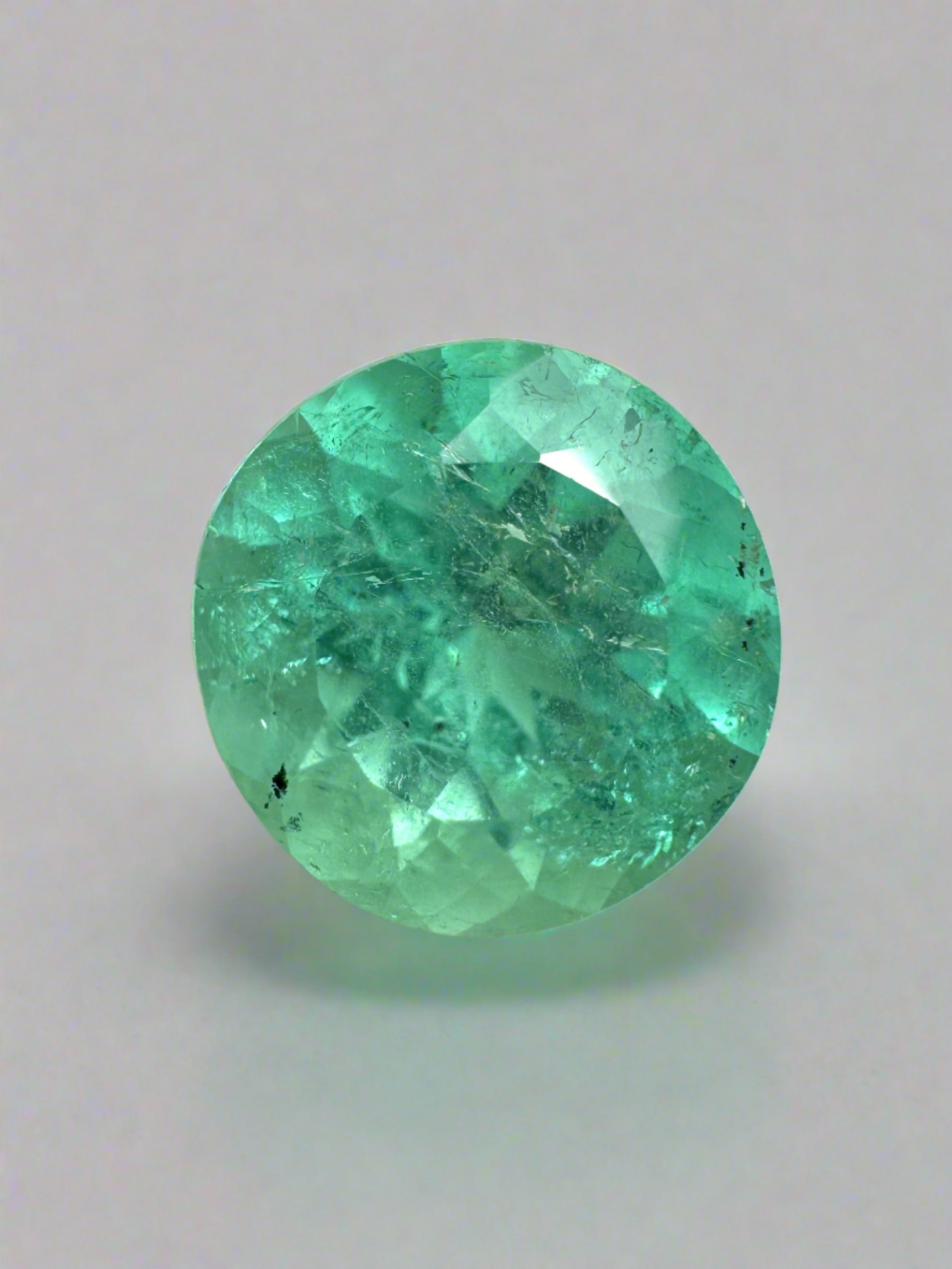 2.87 carat medium green round Colombian emerald loose gemstone from JR Colombian Emeralds, natural and uncut.