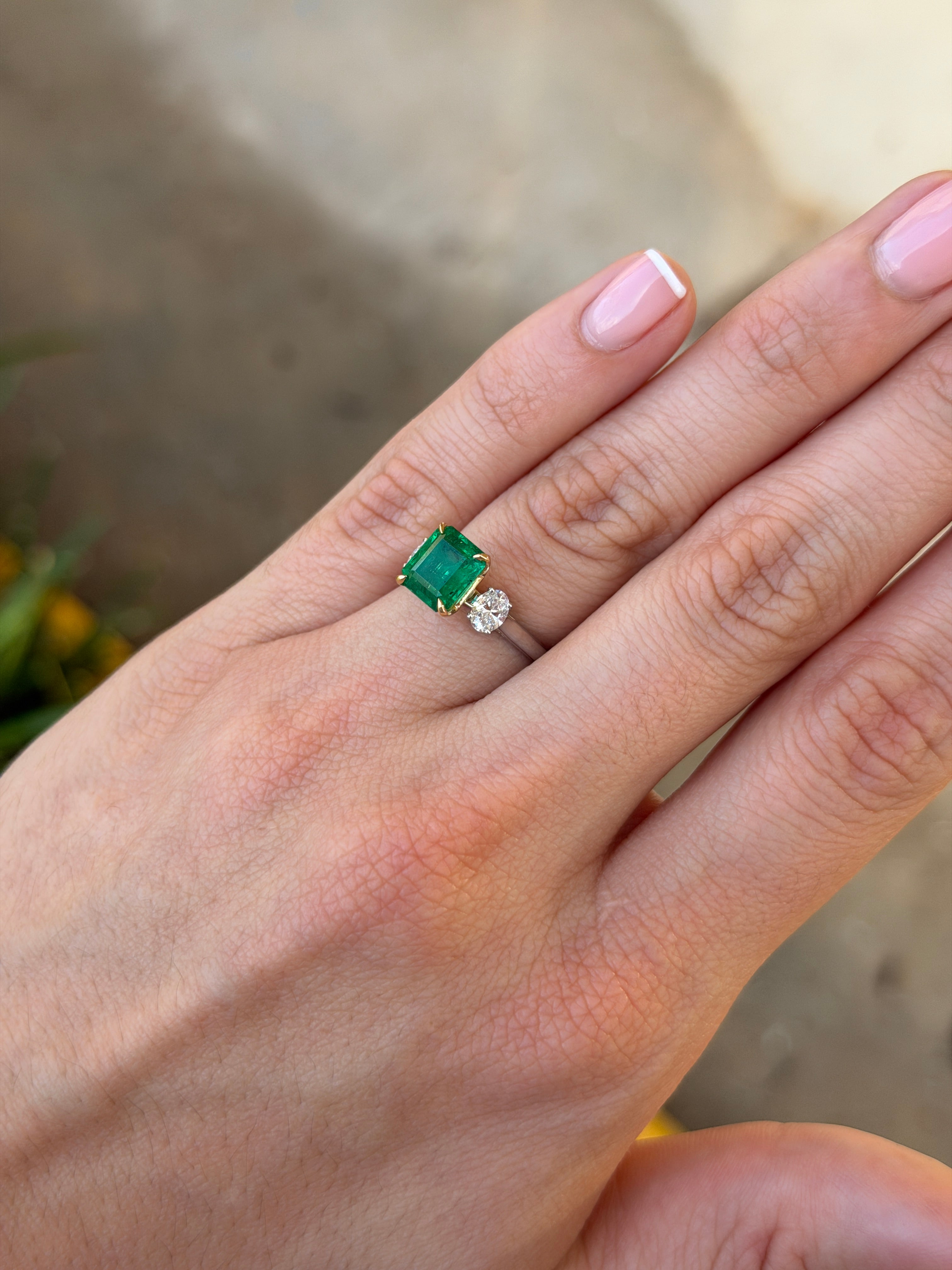 Three-stone emerald and diamond ring featuring 2.88tcw 18K Vivid Asscher Cut Colombian emeralds and platinum setting