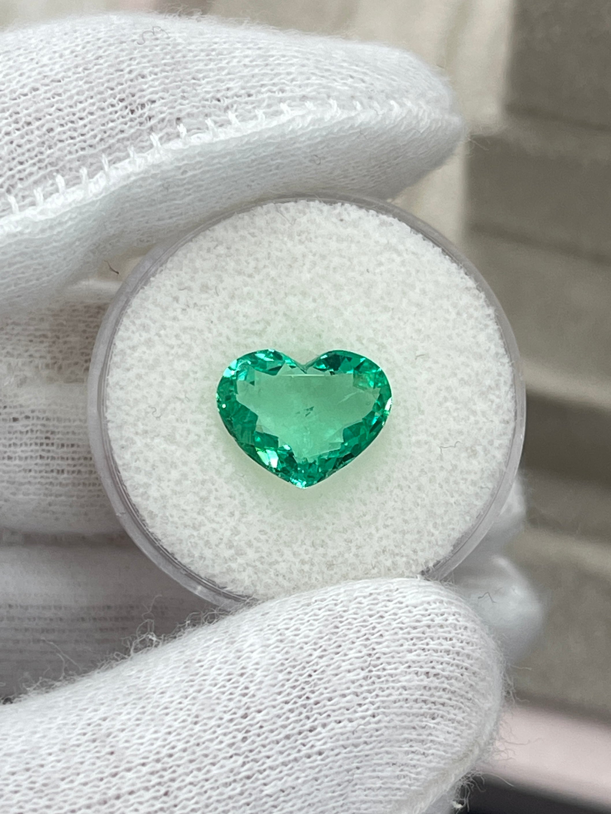 2.91 carat GLOWY green natural Colombian emerald loose heart cut gemstone from JR Colombian Emeralds.