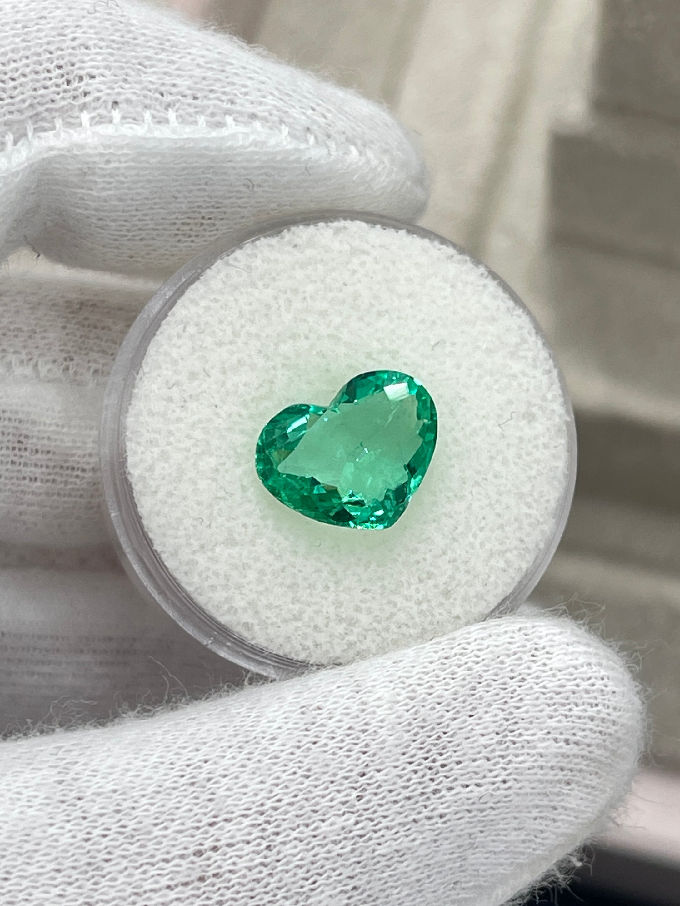 Loose 2.91 carat green Colombian emerald in heart cut, natural GLOWY gemstone from JR Colombian Emeralds.