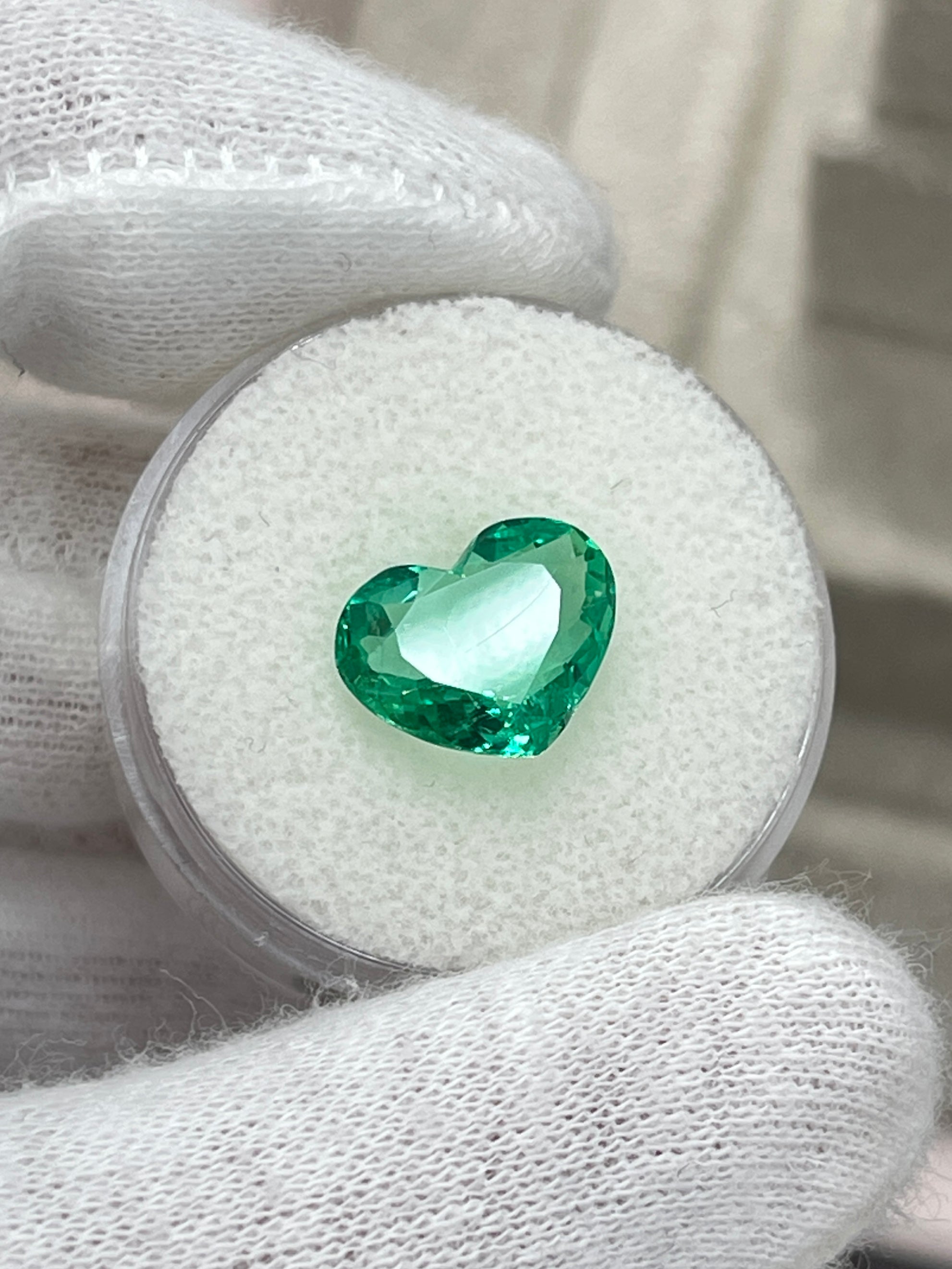 2.91 carat natural Colombian emerald loose gemstone, heart cut, vibrant green color, from JR Colombian Emeralds.