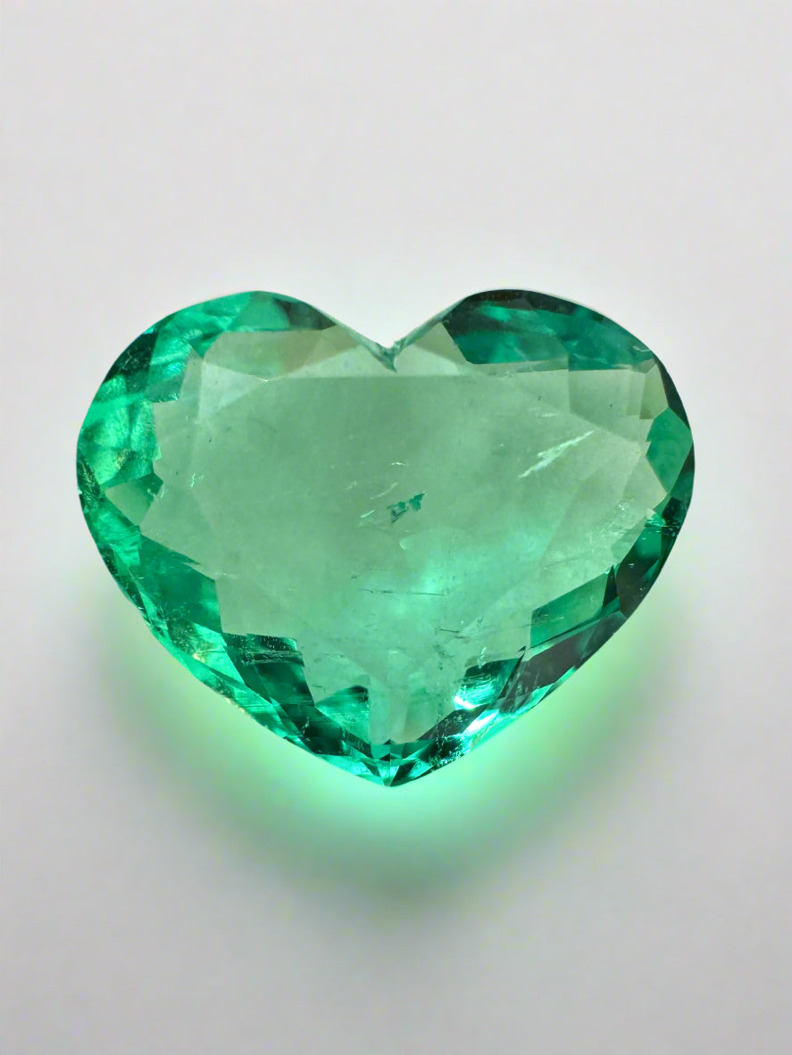 2.91 carat natural Colombian emerald heart cut loose gemstone with vibrant green color, from JR Colombian Emeralds.