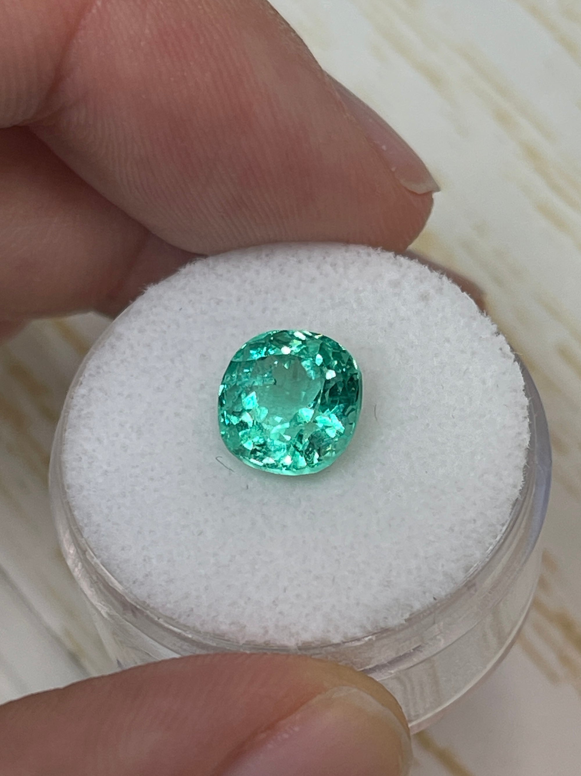2.93 carat VVS natural Colombian emerald in cushion cut, loose gemstone with vibrant green color, from JR Colombian Emeralds.