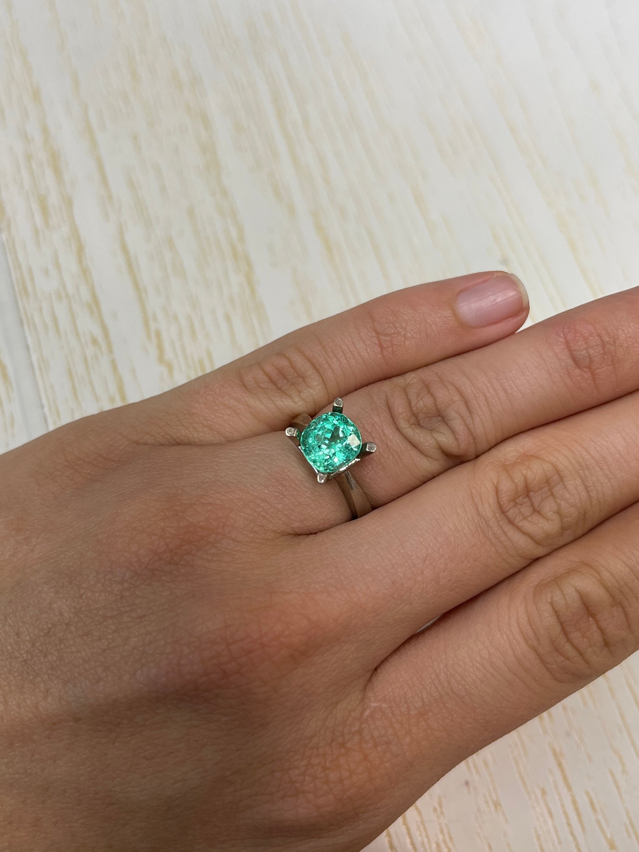 2.93 carat VVS natural Colombian emerald in cushion cut, loose gemstone with vibrant green color and high clarity.