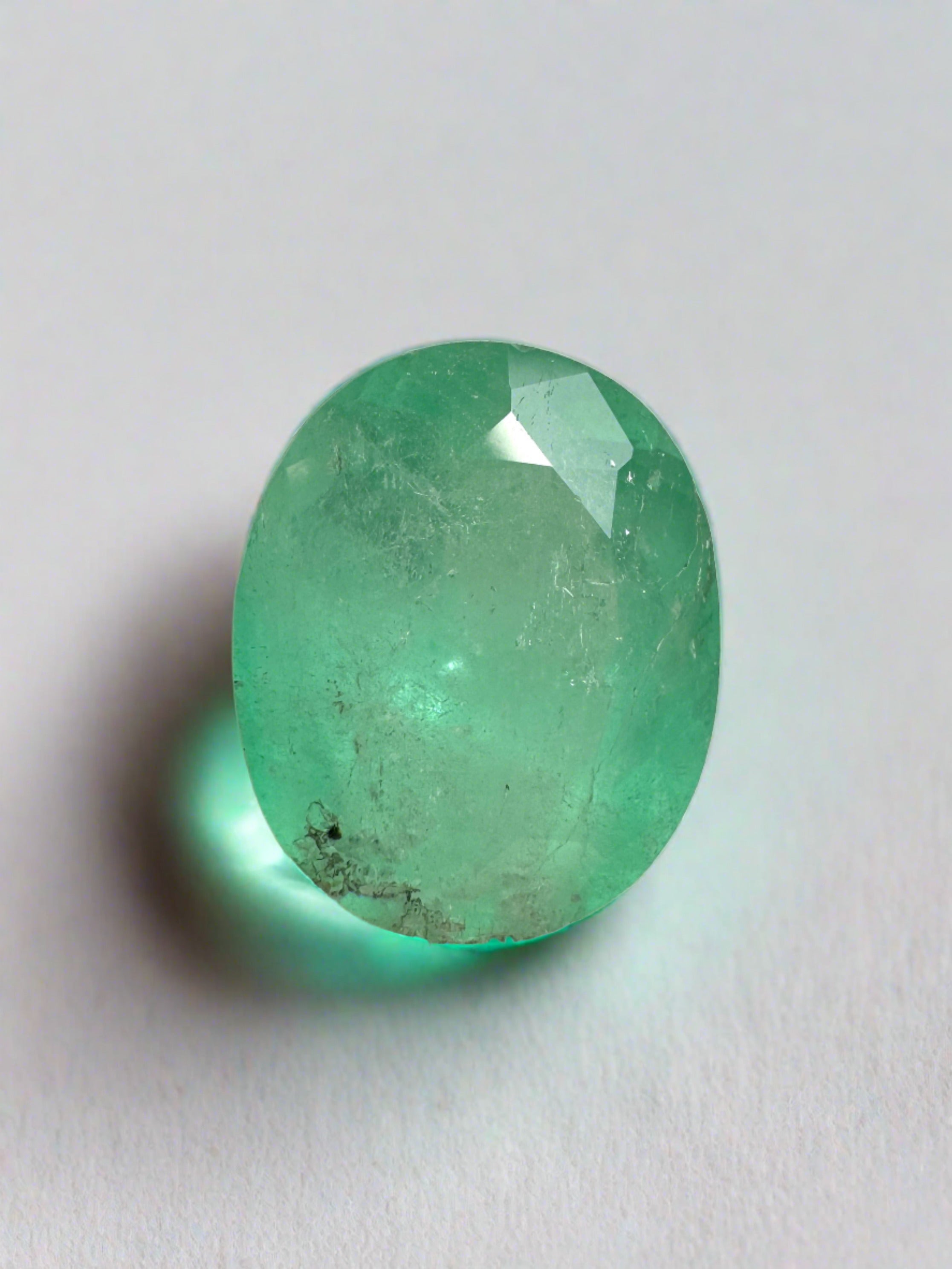 2.95 carat pastel mint green Colombian emerald in oval cut, natural loose gemstone from JR Colombian Emeralds.