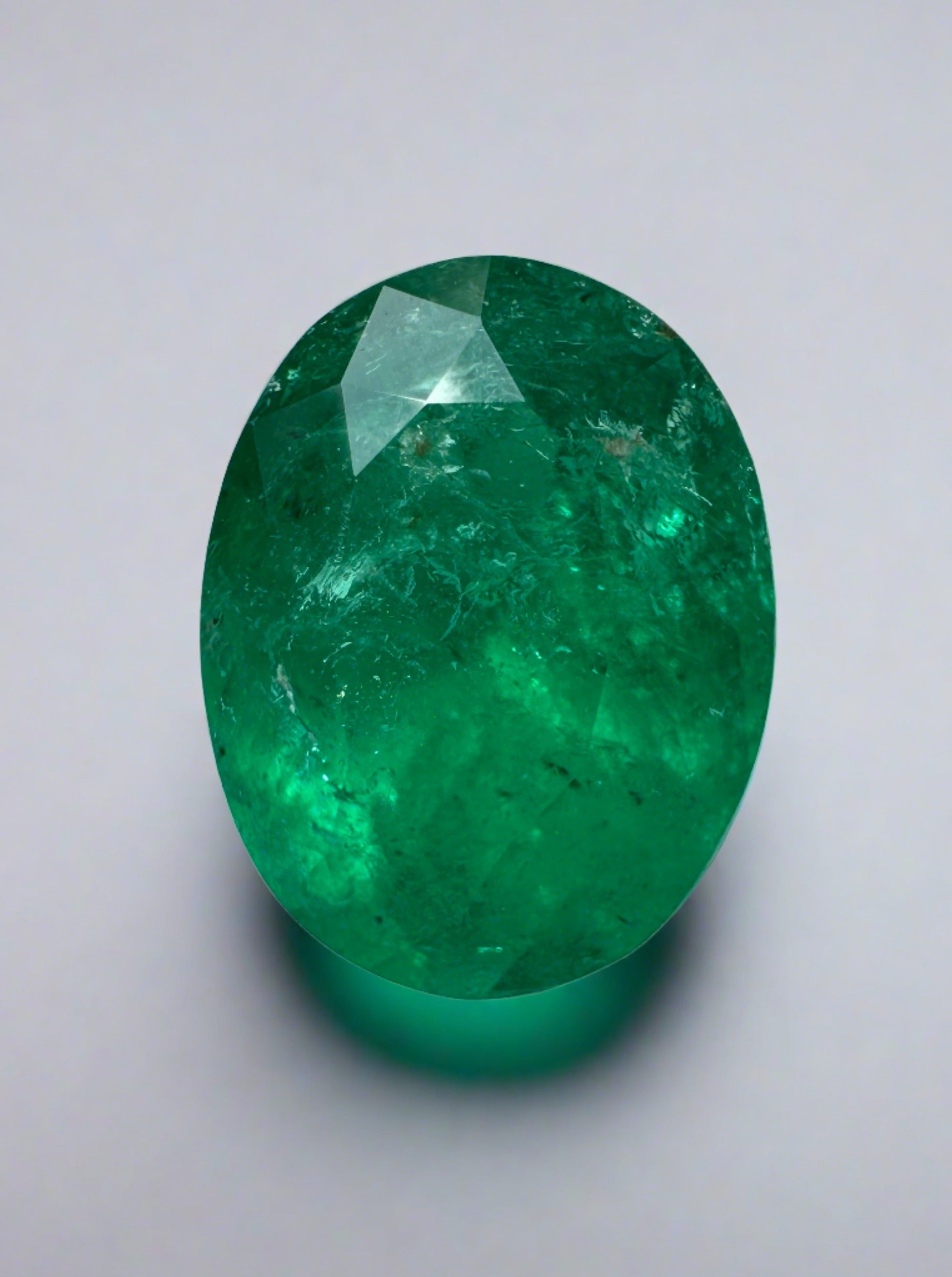 2.98 carat intense dark green Colombian emerald in oval cut, loose gemstone from JR Colombian Emeralds.