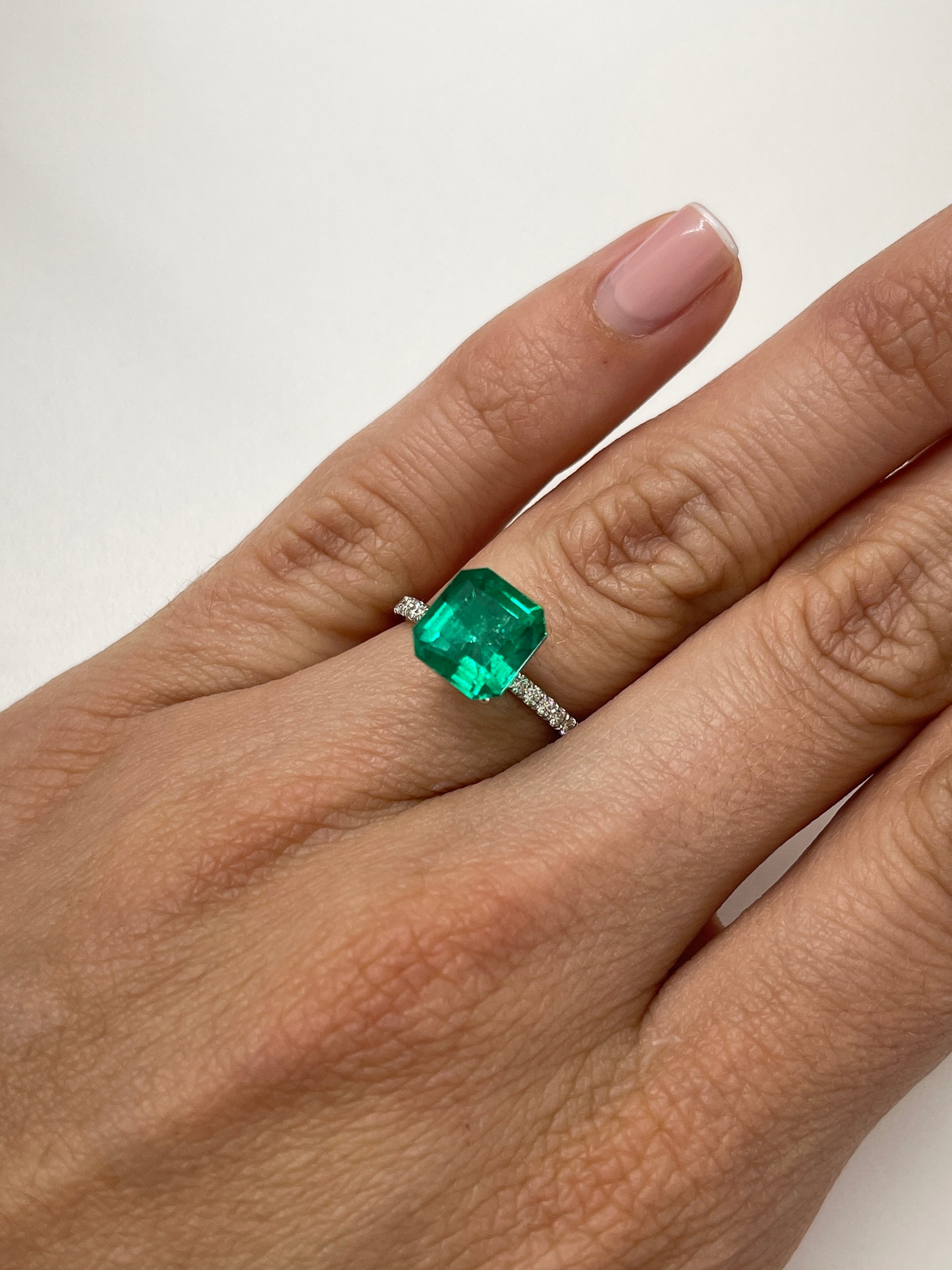 3.06 Carat AAA+ GIA Certified Muzo Green Colombian Emerald Asscher Cut loose gemstone from JR Colombian Emeralds.