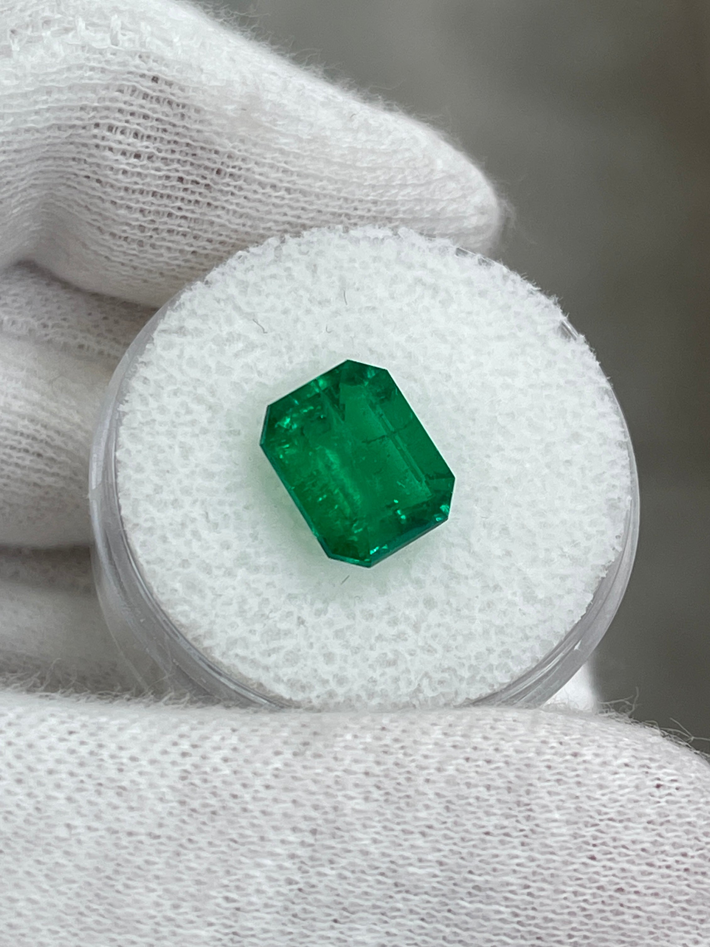 Vivid 3.08 carat Muzo green Colombian emerald loose gemstone in emerald cut, from JR Colombian Emeralds.
