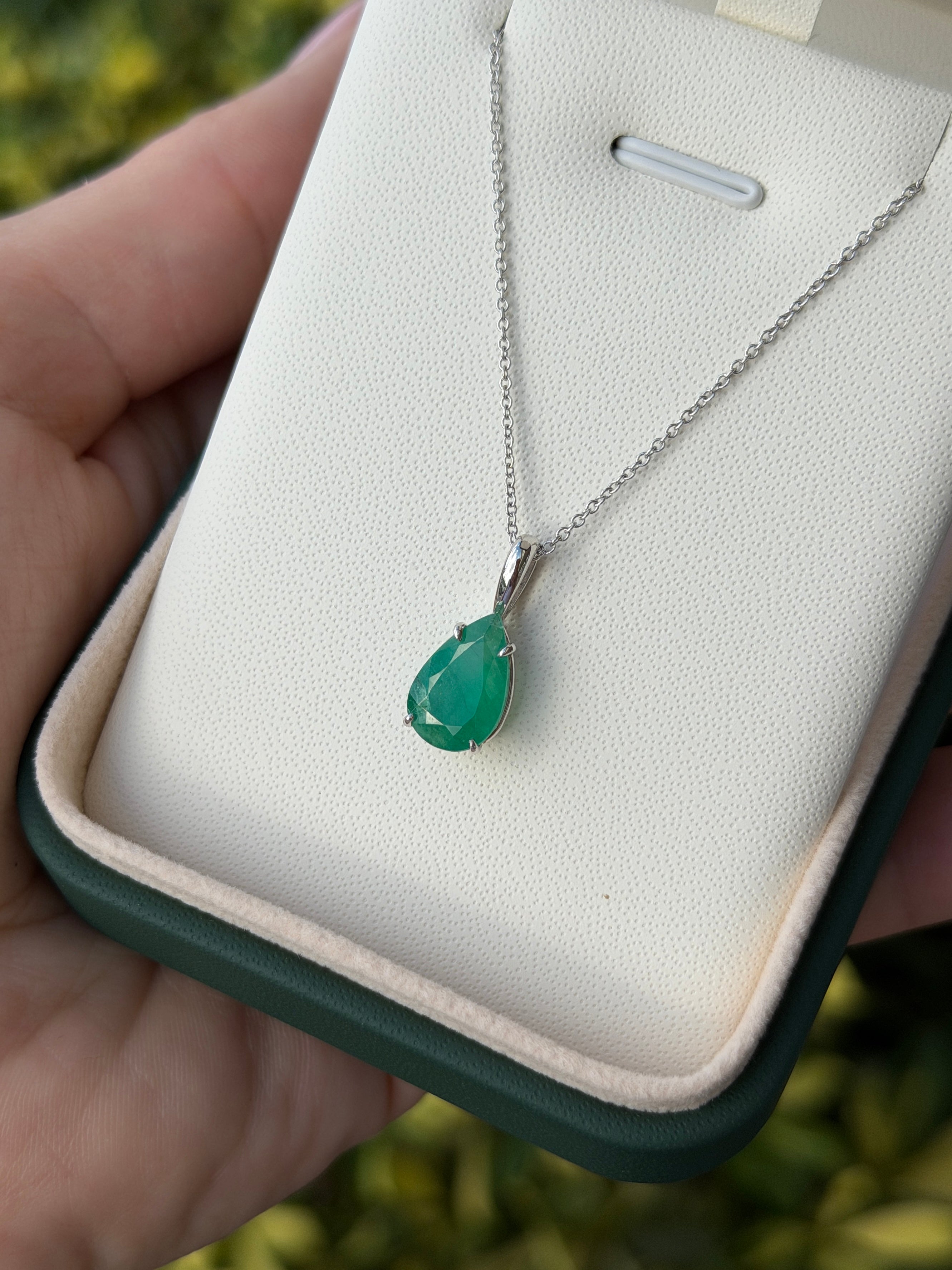 Natural pear-shaped emerald solitaire necklace in 14K white gold with 3.15 carats from JR Colombian Emeralds.