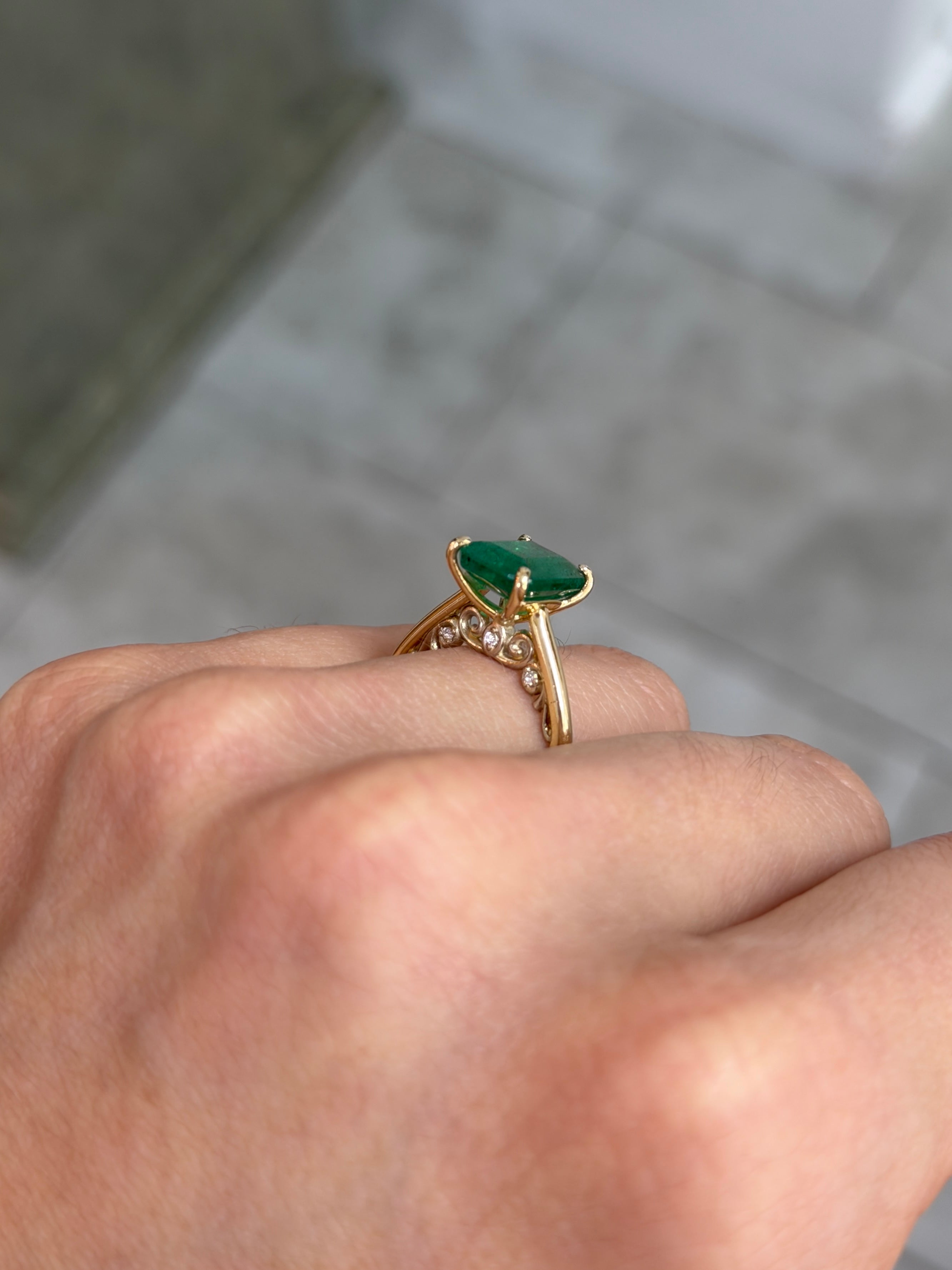 14K natural emerald cut emerald and hidden diamond gallery engagement ring by JR Colombian Emeralds, showcasing detailed craftsmanship.