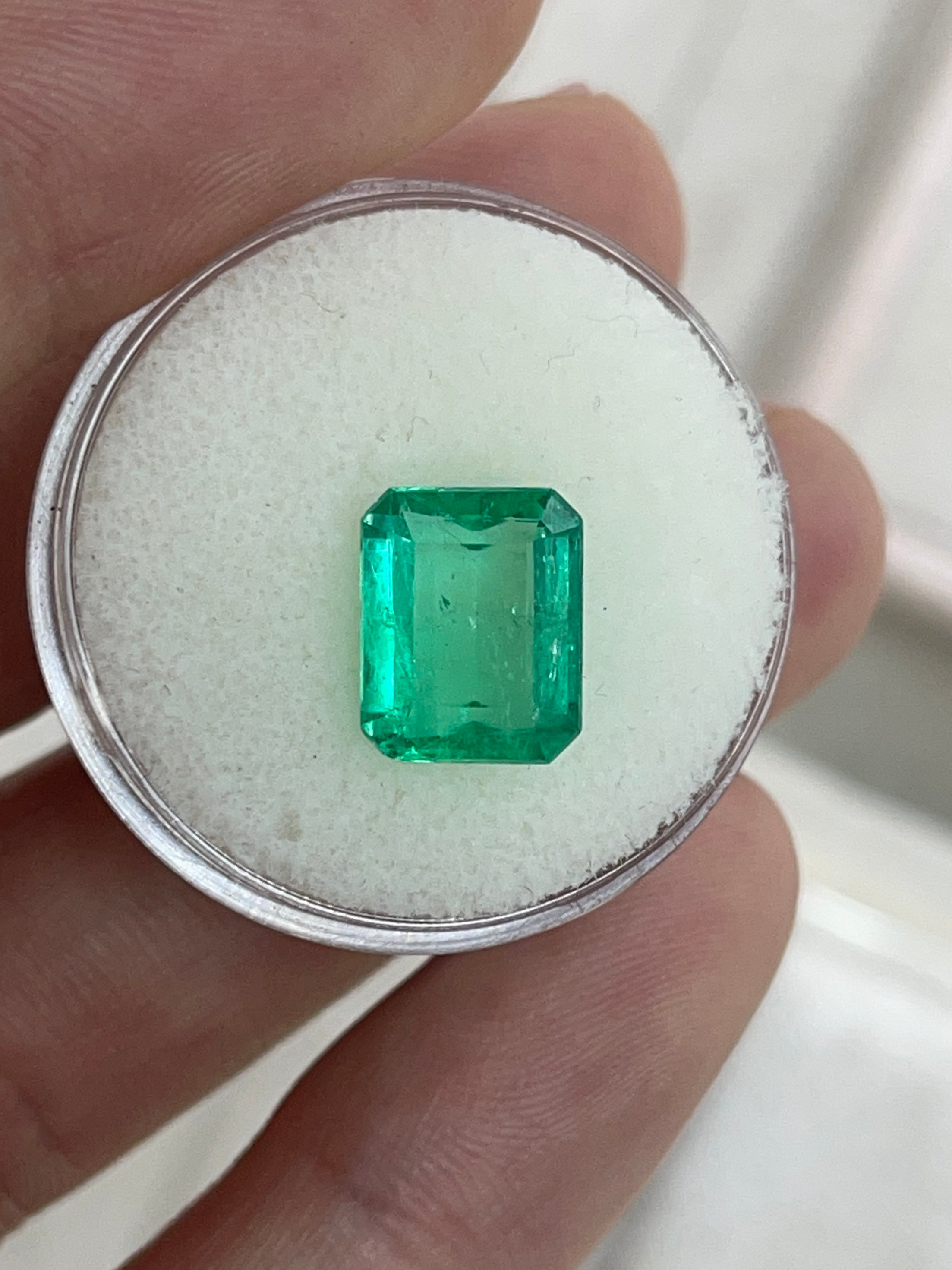Loose 3.22ct Muzo Colombian emerald gemstone, yellowish green, spready cut, 10.4x8.4mm, crystal clear, earth-mined gemstone.