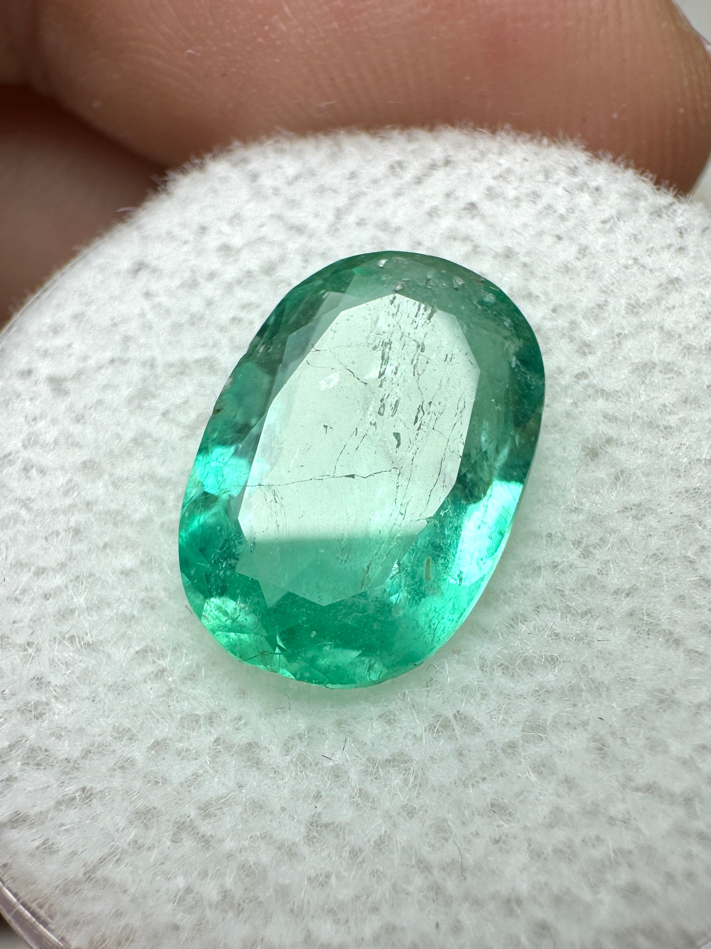 3.25-carat oval-cut green natural Colombian emerald gemstone from JR Colombian Emeralds, showcasing its vibrant color and clarity.
