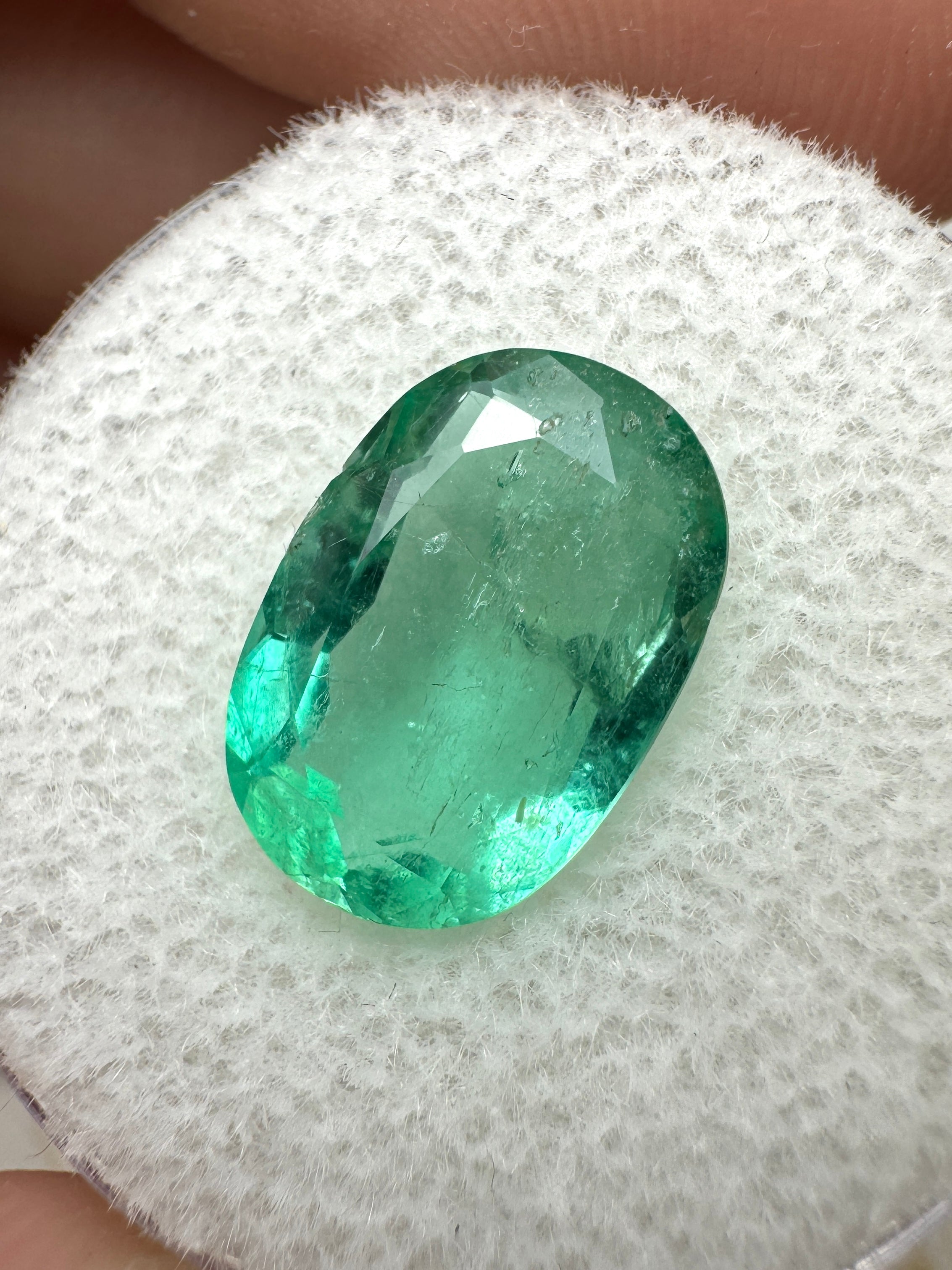 3.25 carat oval-cut green Colombian emerald, natural loose gemstone from JR Colombian Emeralds, with vibrant deep green color.