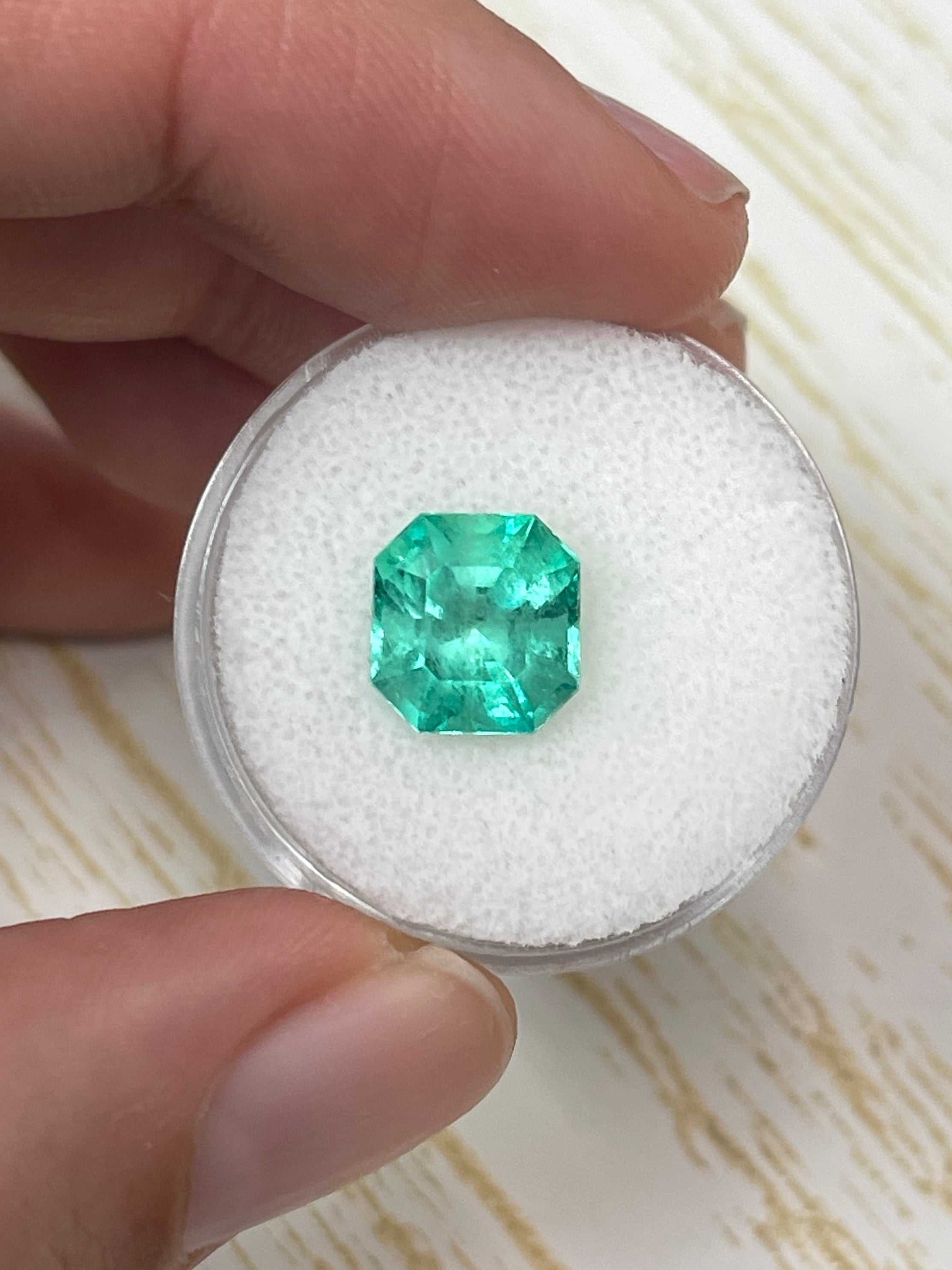 Natural 3.27 carat Colombian emerald in an Asscher cut, showcasing vibrant green color and clarity from JR Colombian Emeralds.