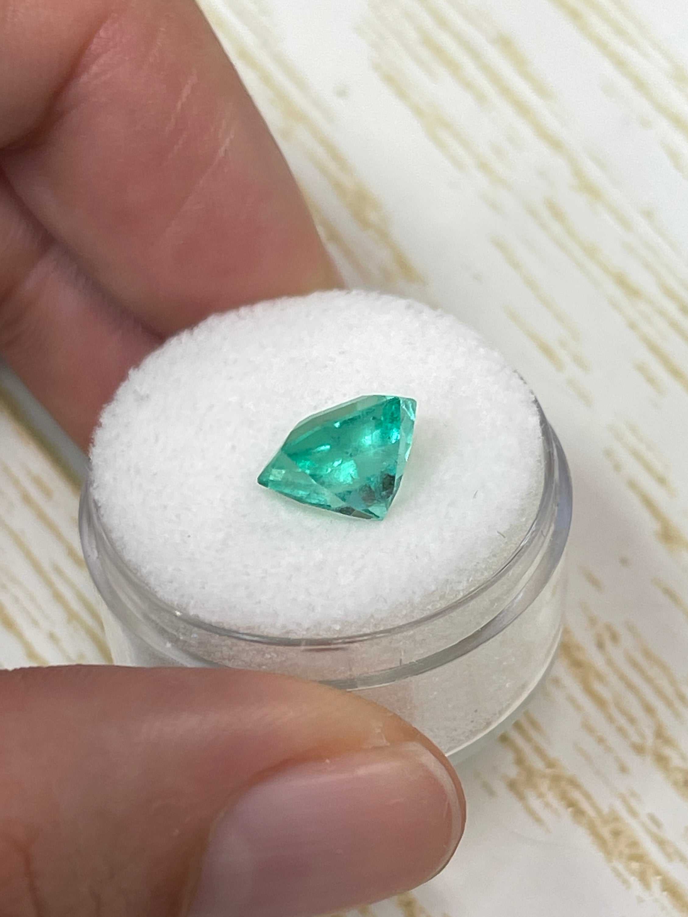 Natural 3.27 Carat Colombian Emerald in Asscher cut, loose gemstone from JR Colombian Emeralds, with vibrant green color and clarity.