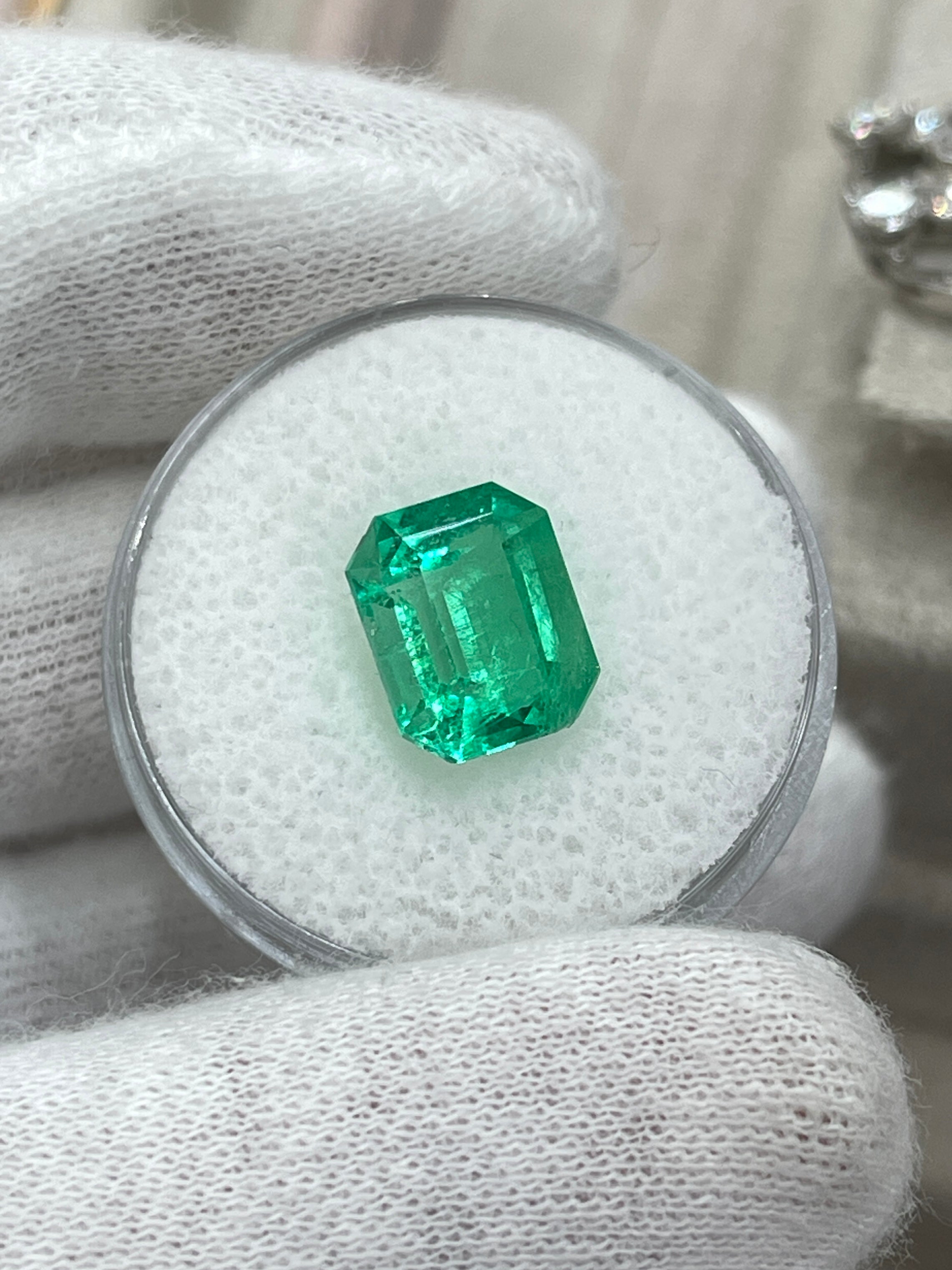 Bright green 3.30 carat natural Colombian emerald loose gemstone in emerald cut, from JR Colombian Emeralds.