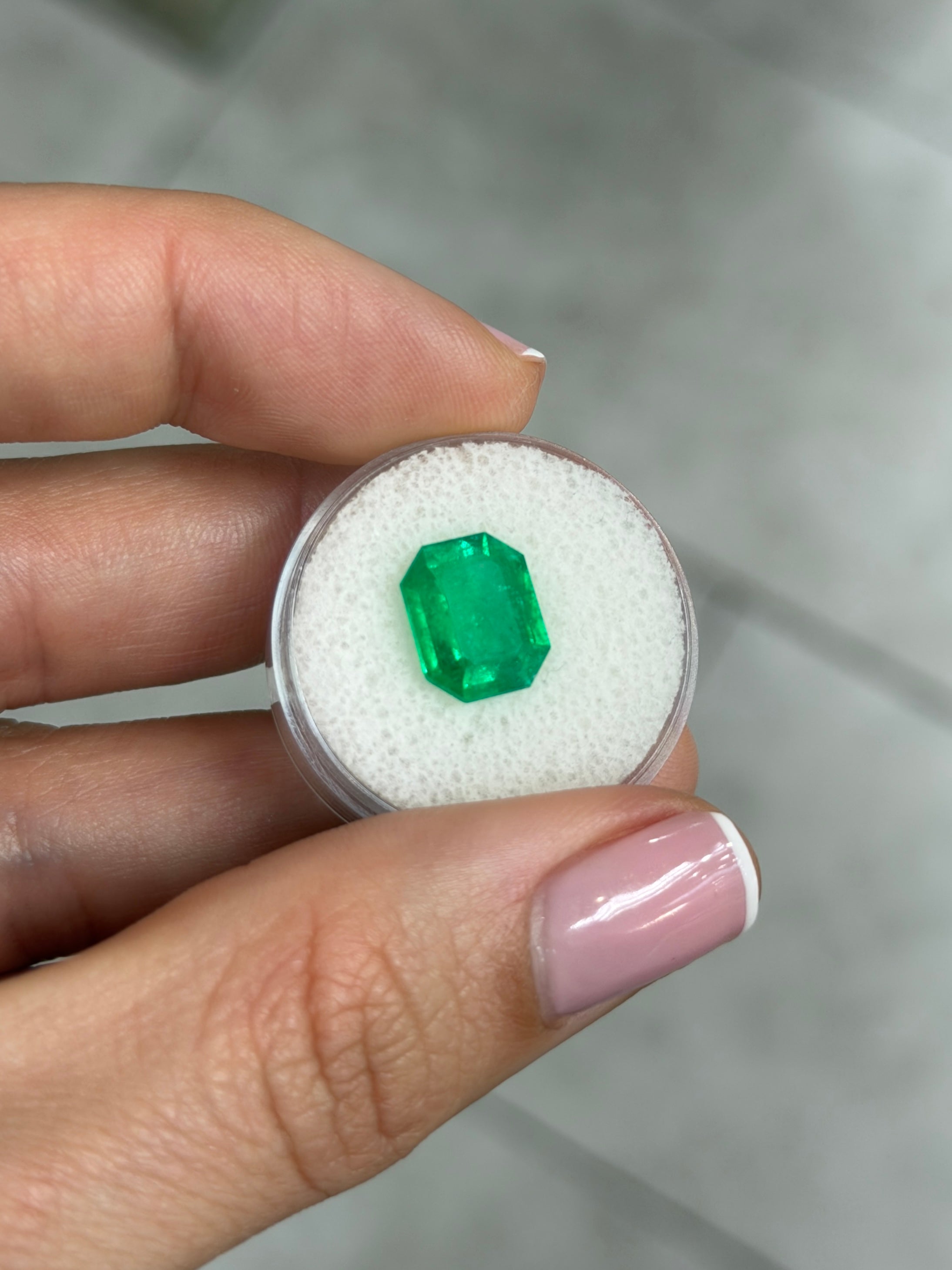3.30 carat Muzo Colombian emerald cut loose green emerald by JR Colombian Emeralds, natural and vibrant with rich green color.