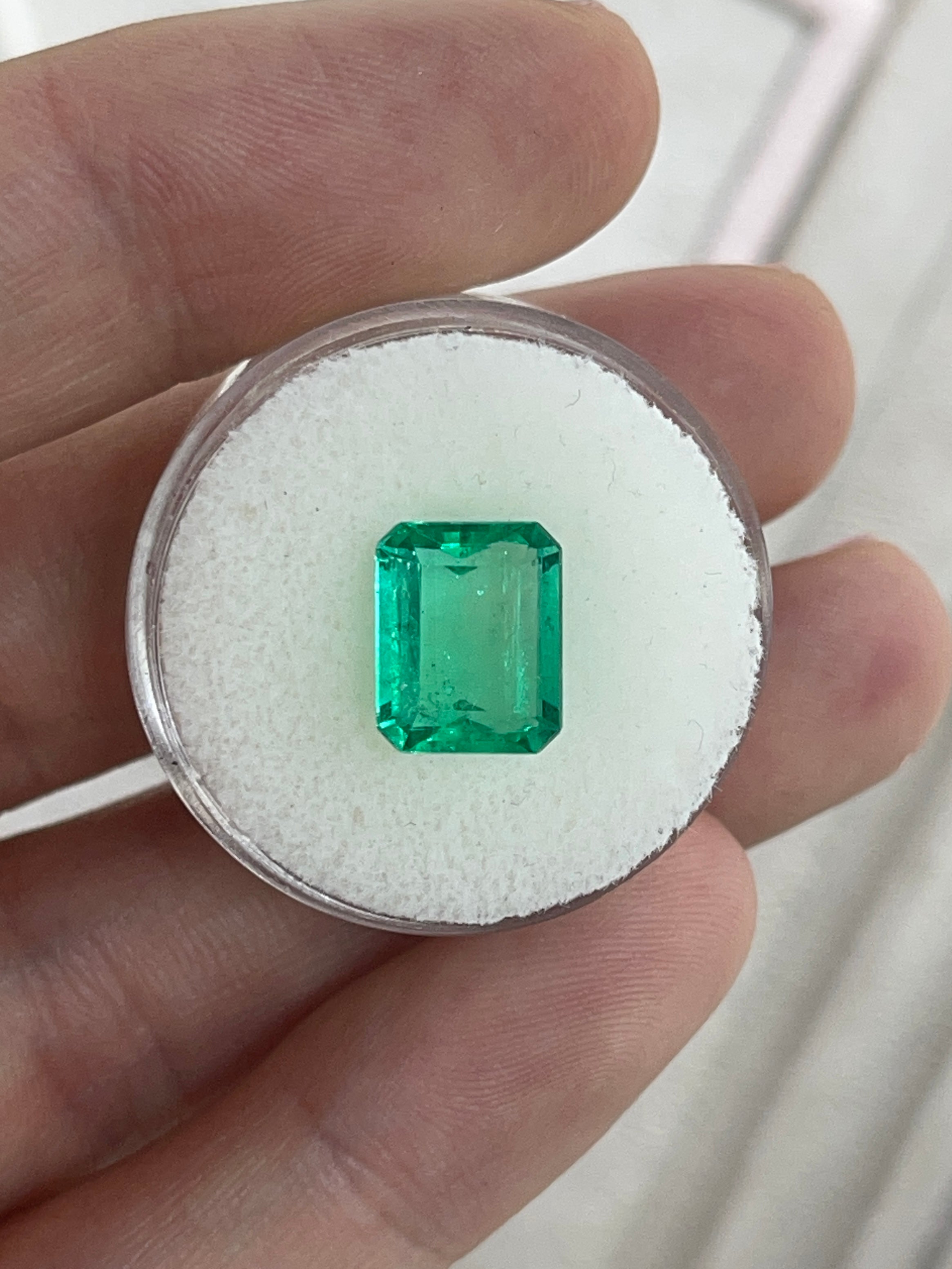 3.30ct Muzo Colombian Emerald gemstone, yellowish-green crystal, spready cut, 10.4x8.4mm, earth-mined loose gemstone.
